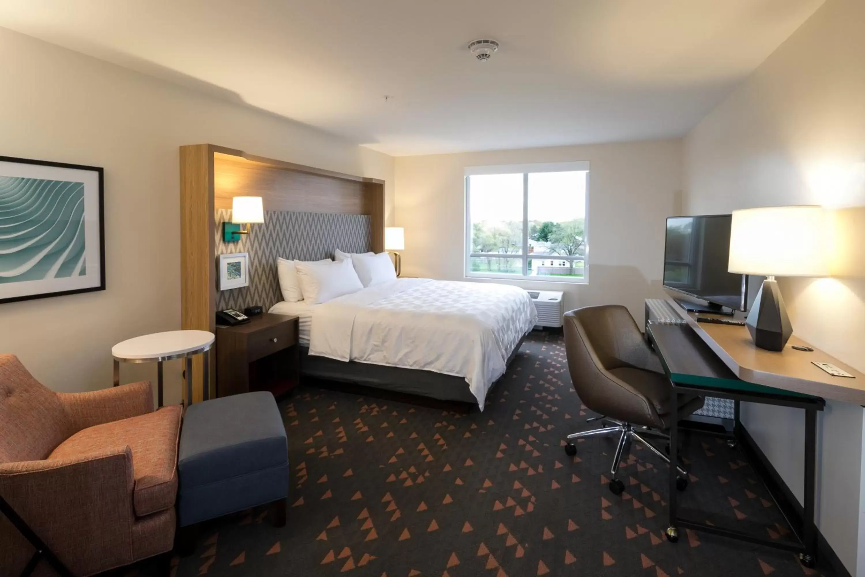 Bed in Holiday Inn & Suites Detroit - Troy, an IHG Hotel