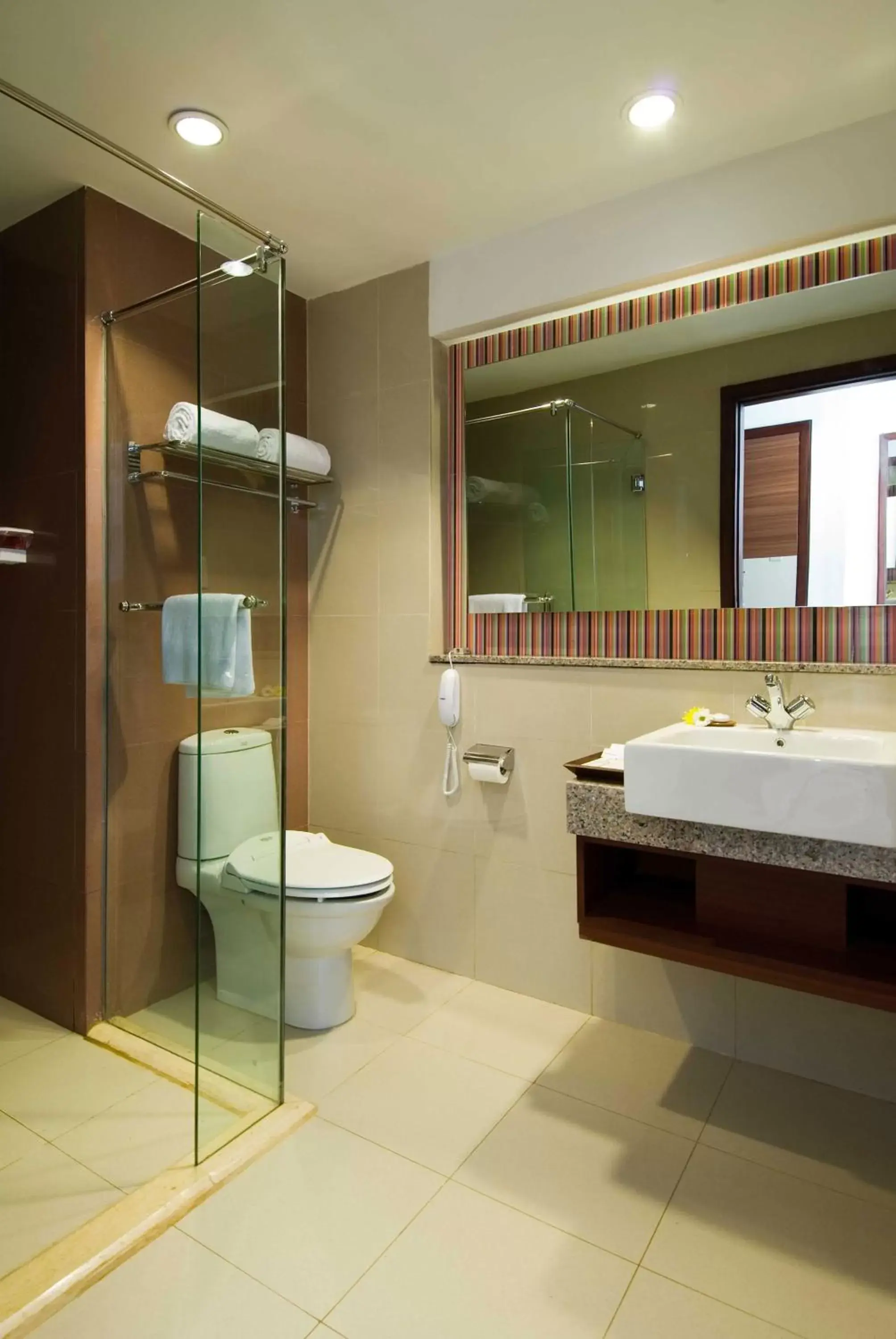Bedroom, Bathroom in ASTON Manado Hotel