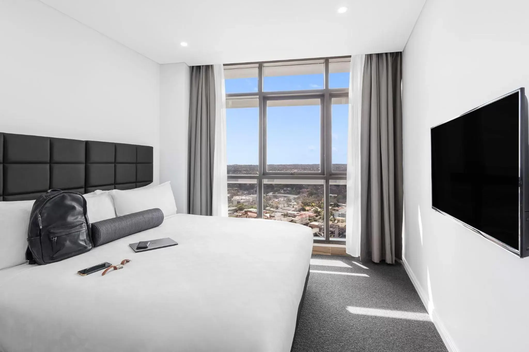 Bed in Meriton Suites Church Street, Parramatta