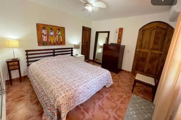 Bed in Los Corales Luxury Villas Beach Club and Spa