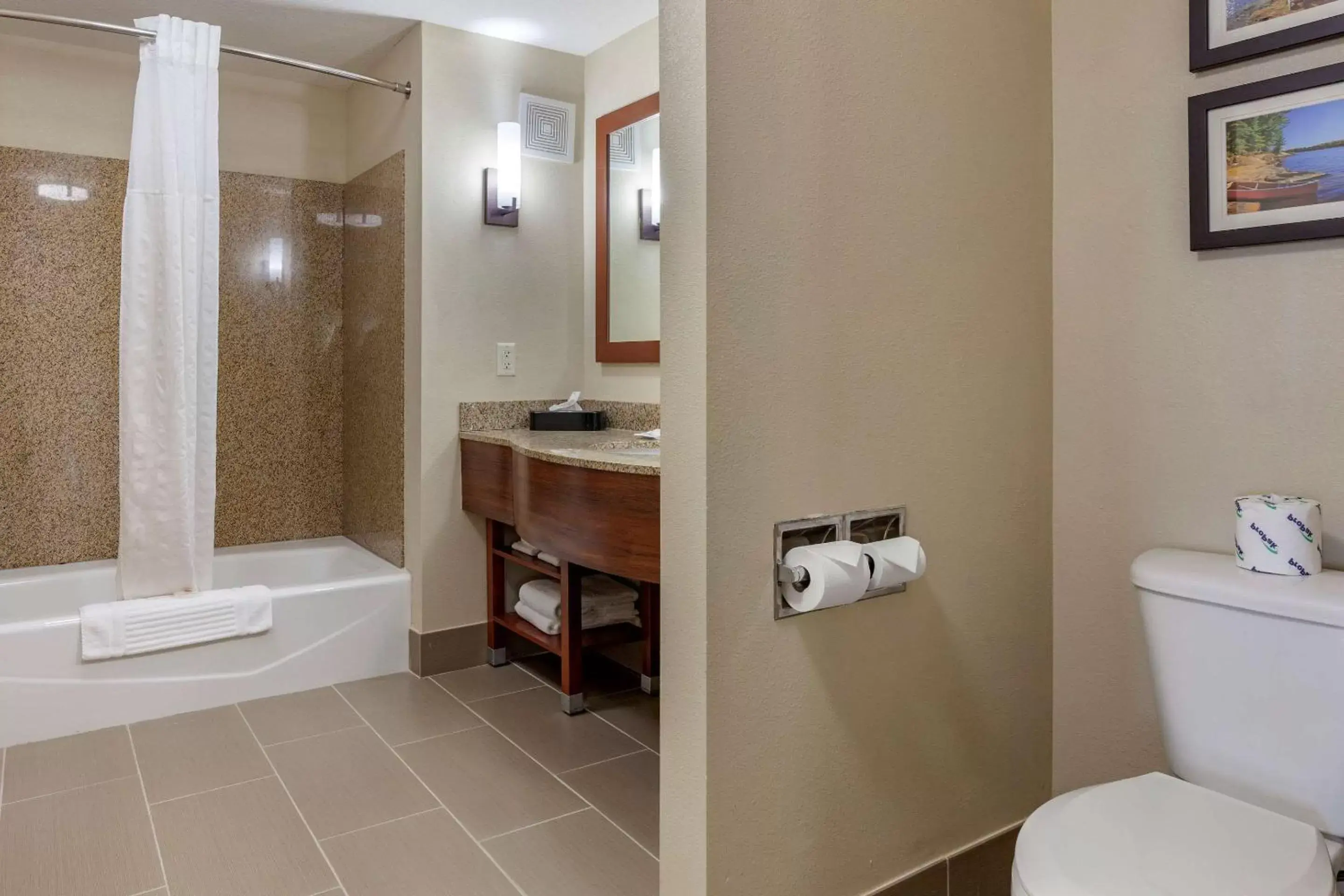 Bedroom, Bathroom in Comfort Suites Oshkosh