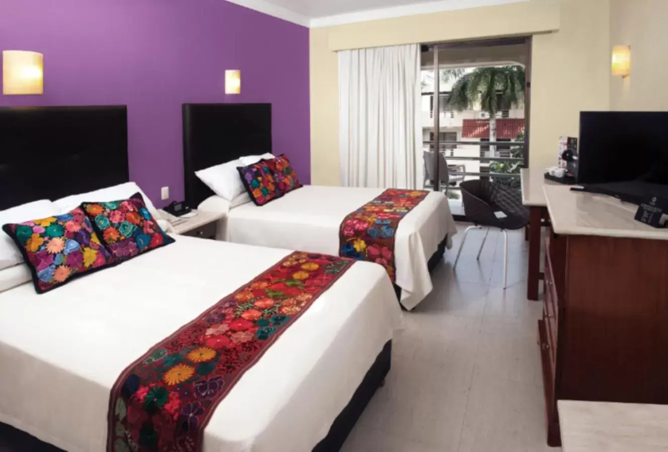 Bed in Adhara Hacienda Cancun