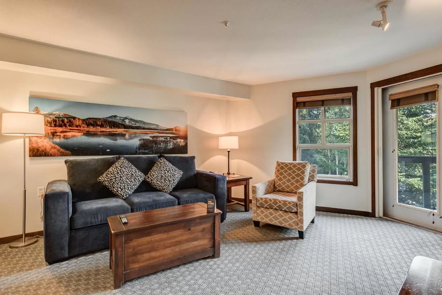 Living room, Seating Area in Blackcomb Springs Suites by CLIQUE