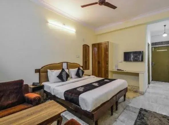 Bed in Hotel Vinayakam
