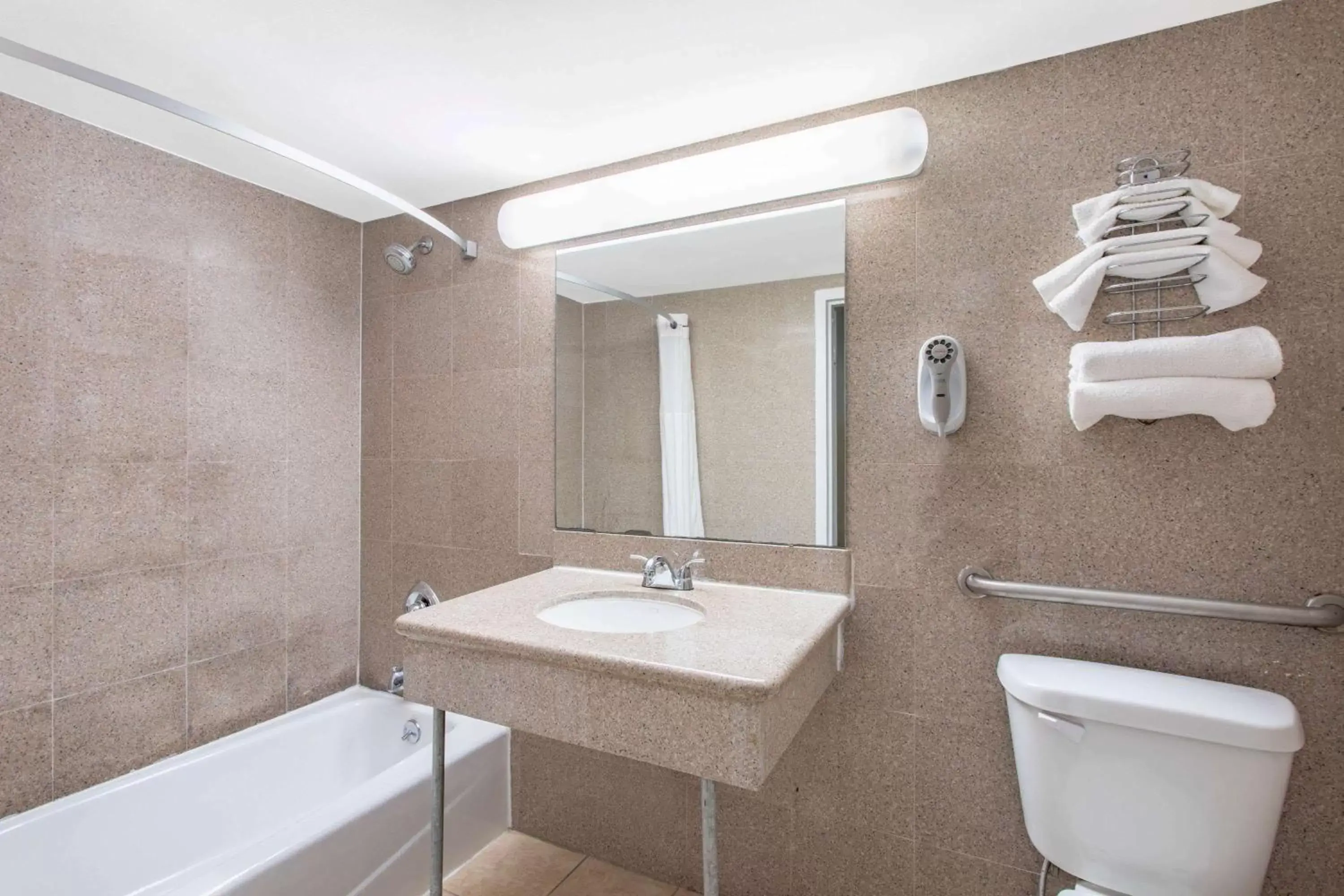 Bathroom in Days Inn by Wyndham Elmsford