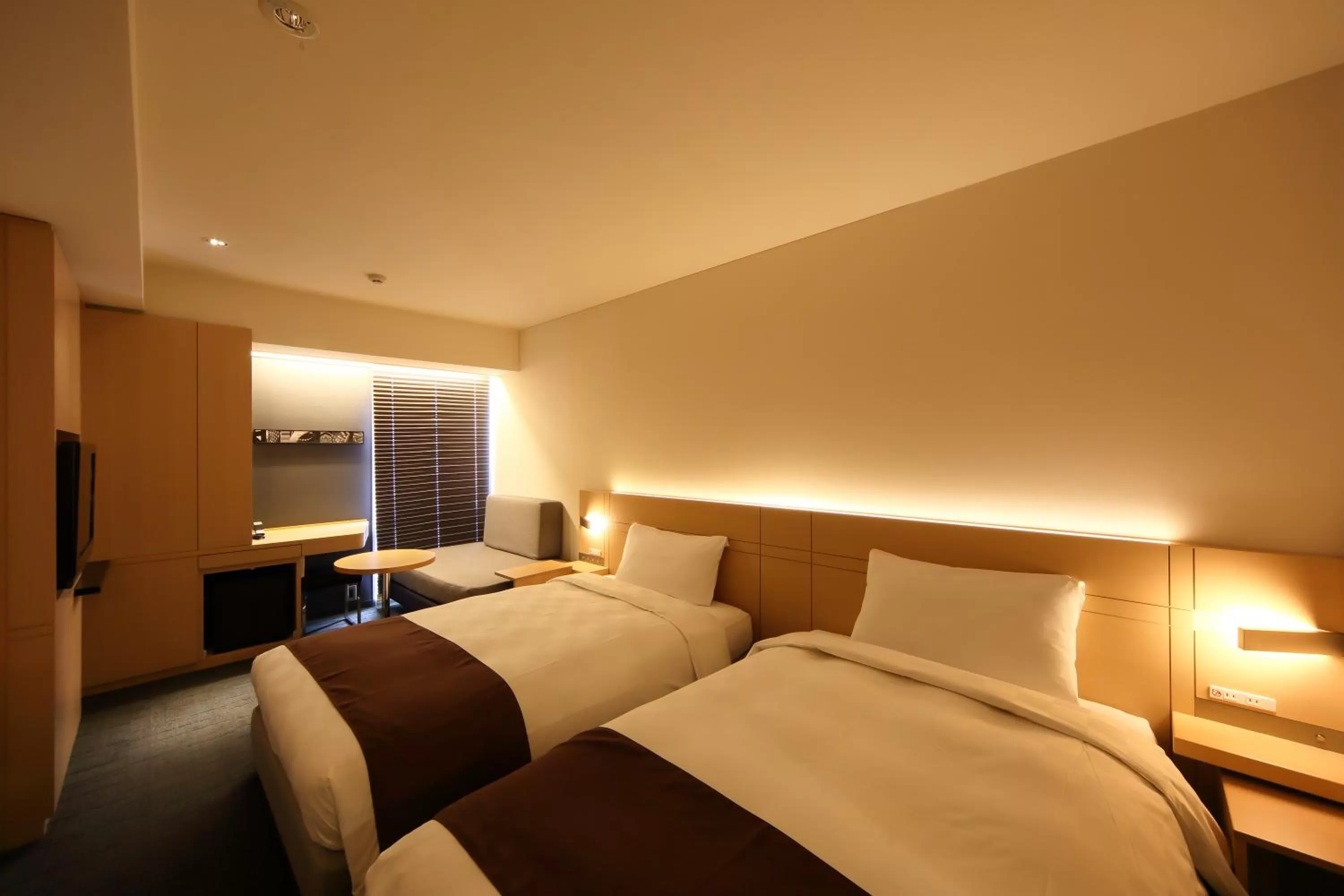 Bed in Hakata Tokyu REI Hotel