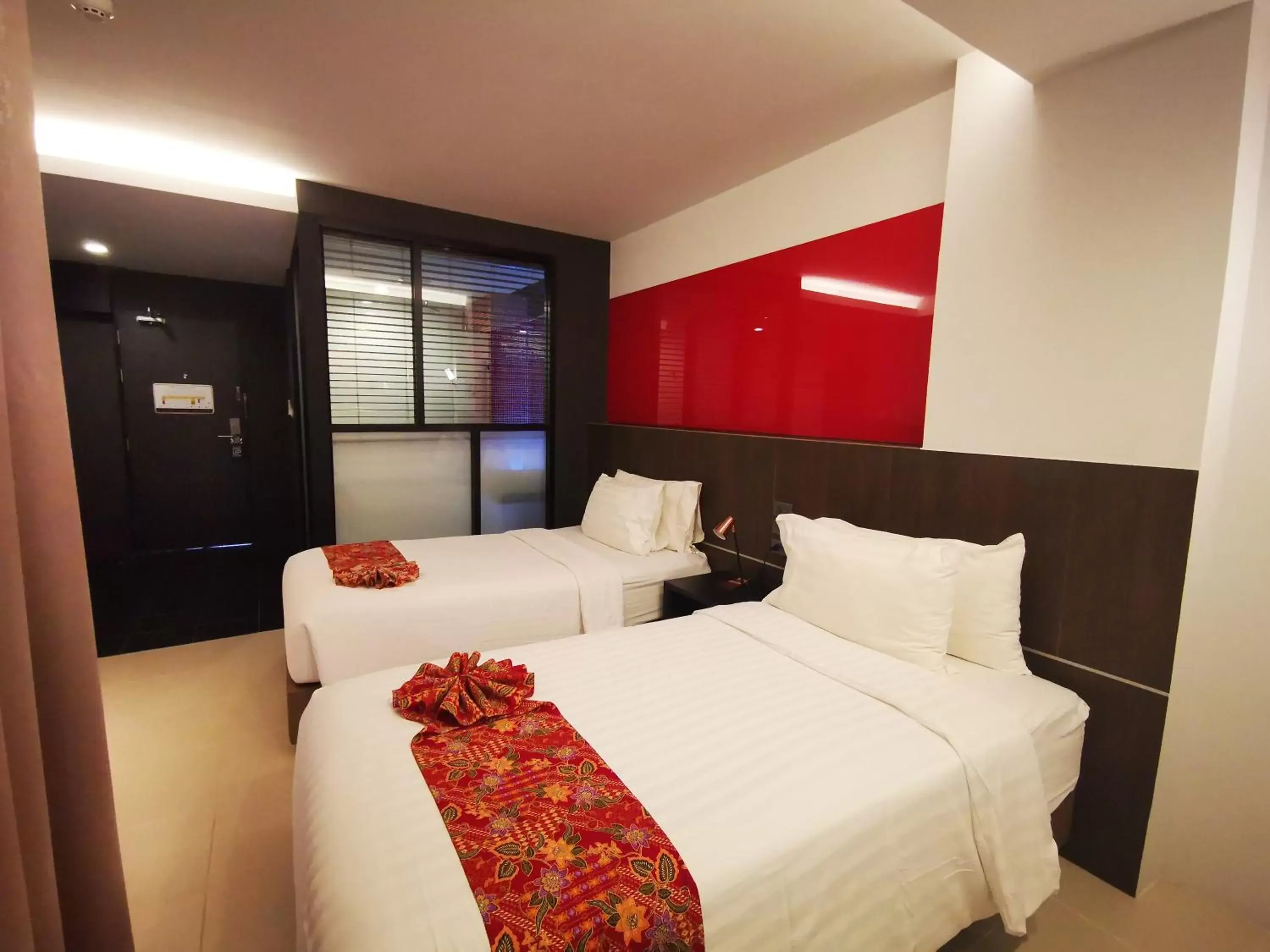 Bed in Mandy Nok Hotel
