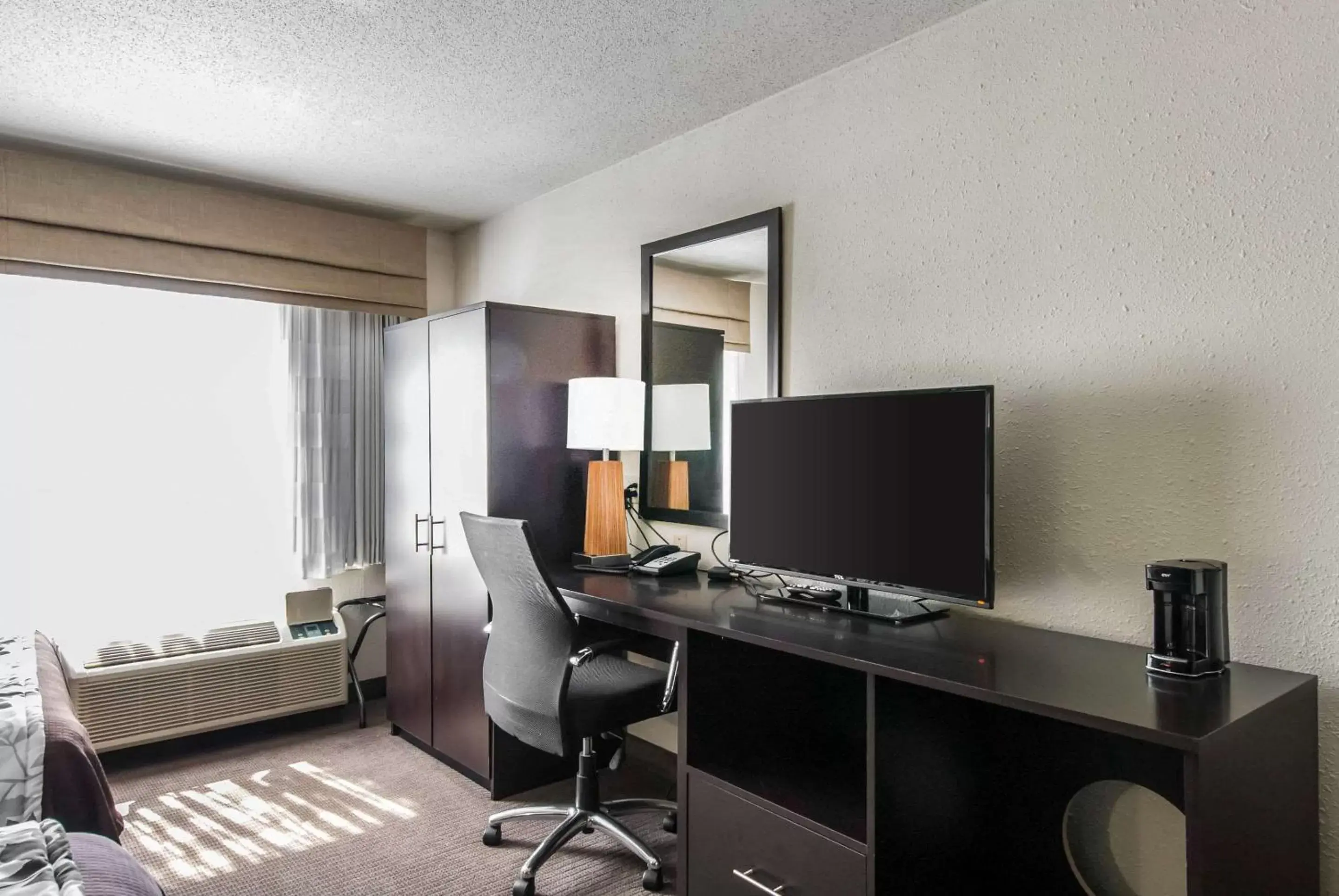 Photo of the whole room, TV/Entertainment Center in Sleep Inn Saint Charles