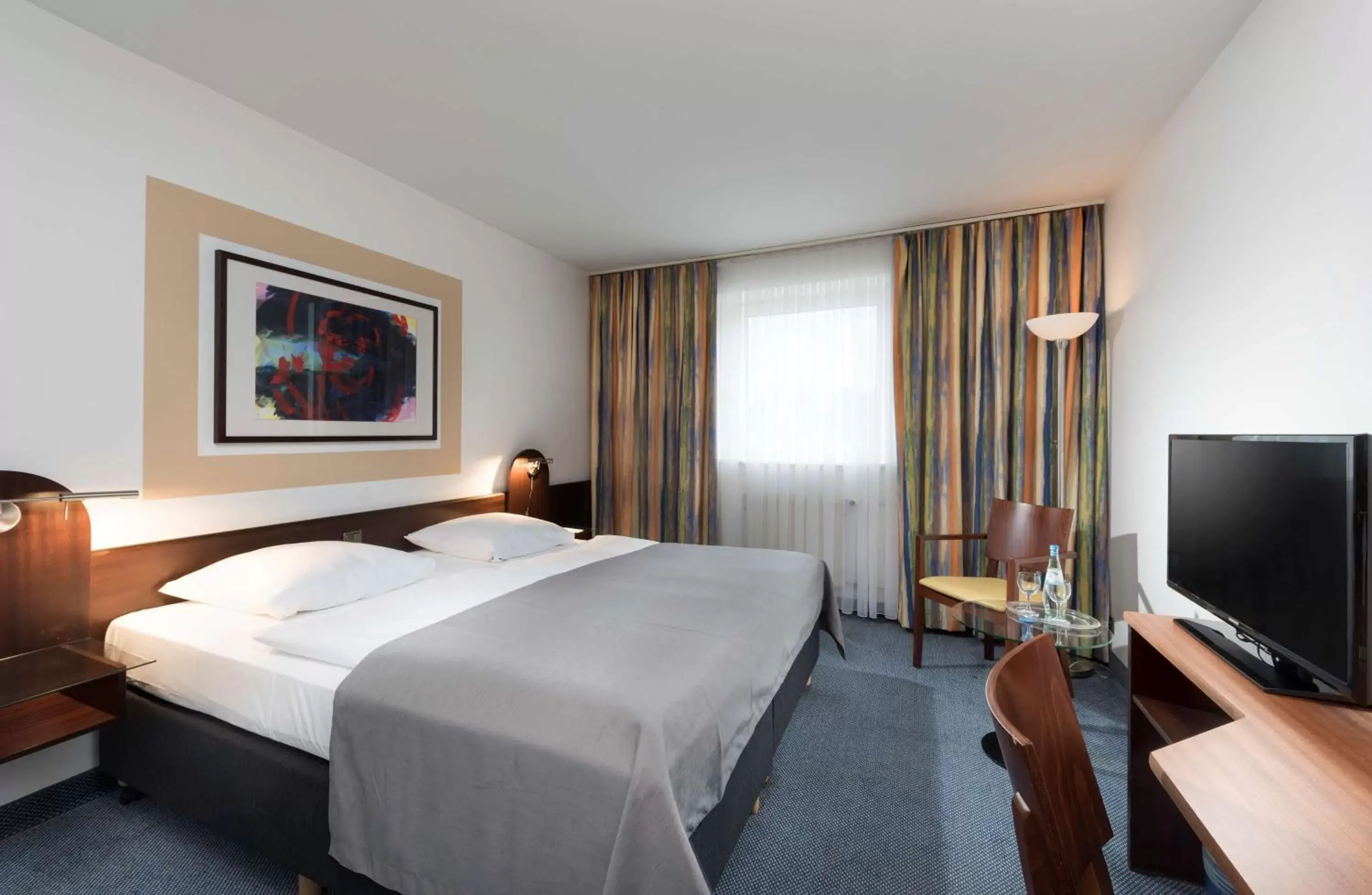 Photo of the whole room, Bed in Ramada by Wyndham Flensburg