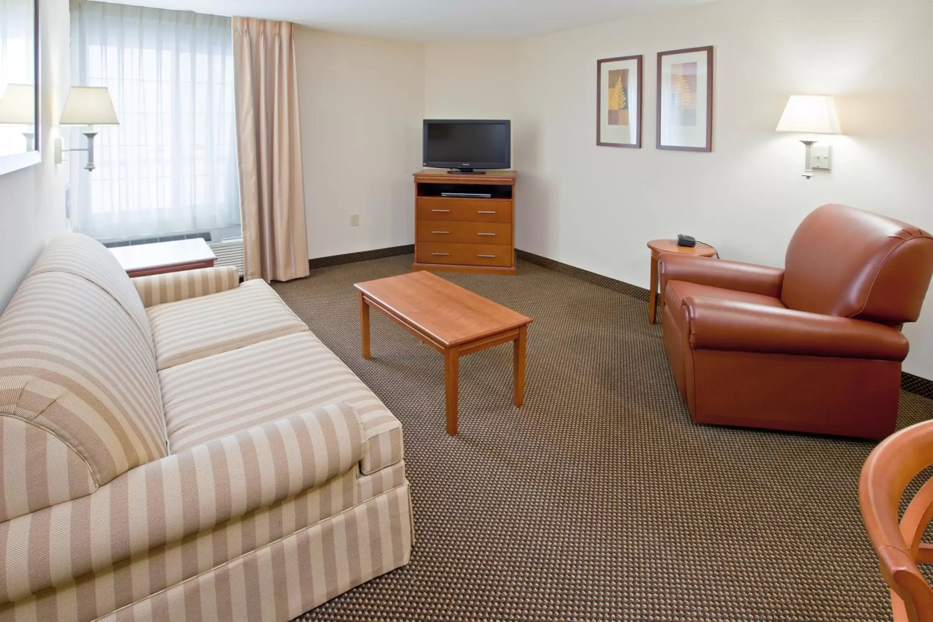 TV and multimedia, Seating Area in Candlewood Suites Radcliff - Fort Knox, an IHG Hotel