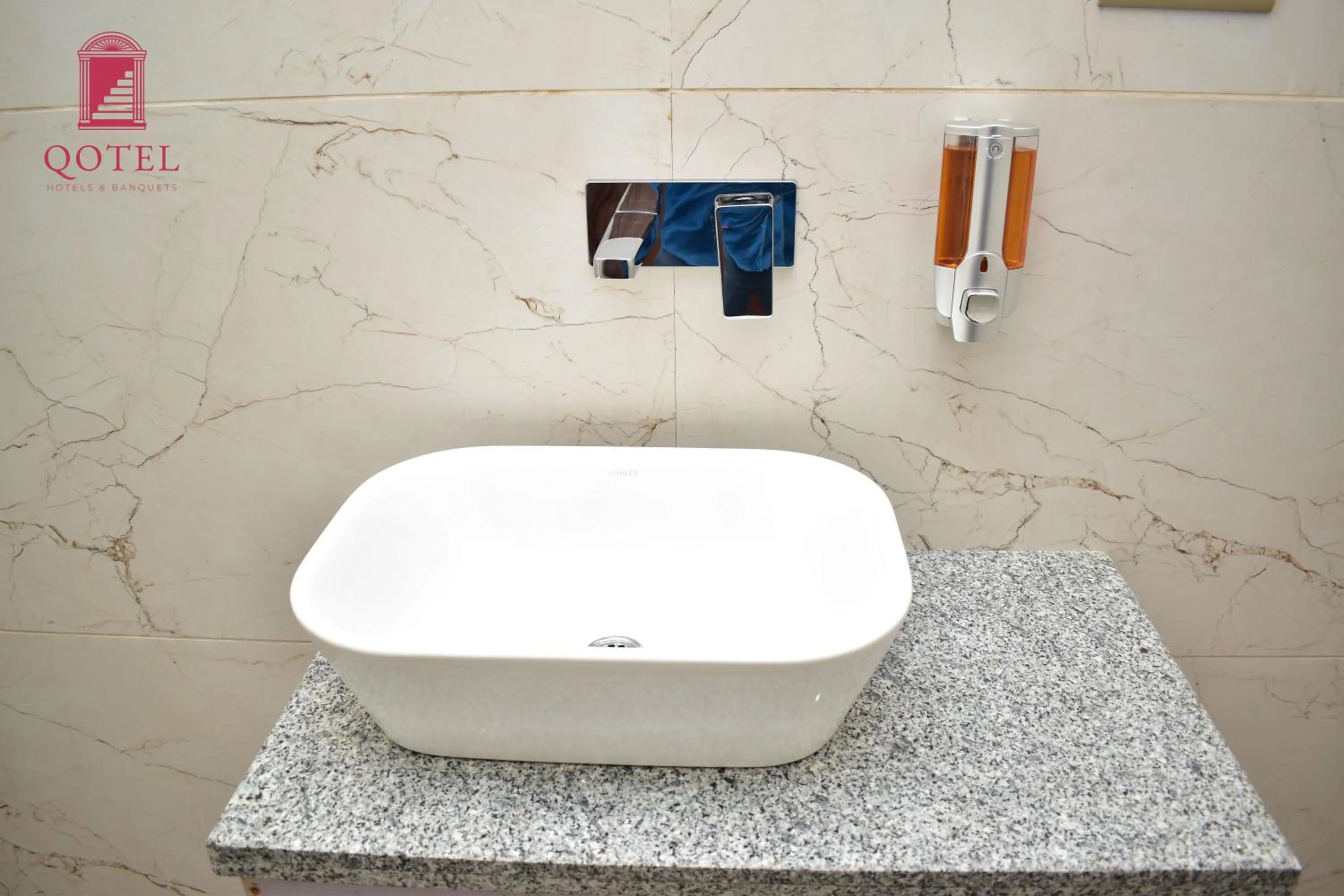 Bathroom in Qotel Comfort Ashok Vihar - Near Delhi University