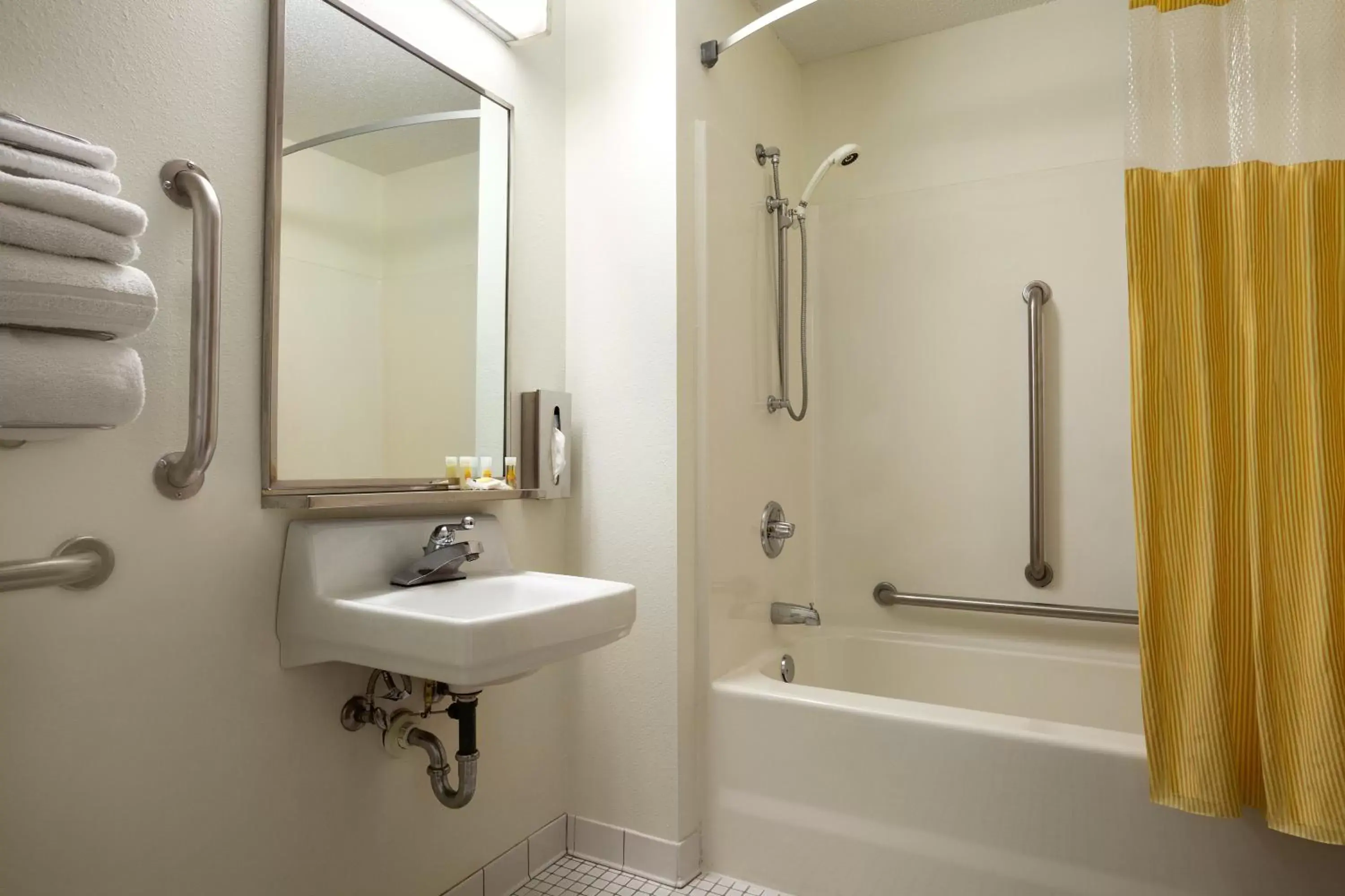 Bathroom in Days Inn by Wyndham Austin Bathroom in Days Inn by Wyndham Austin