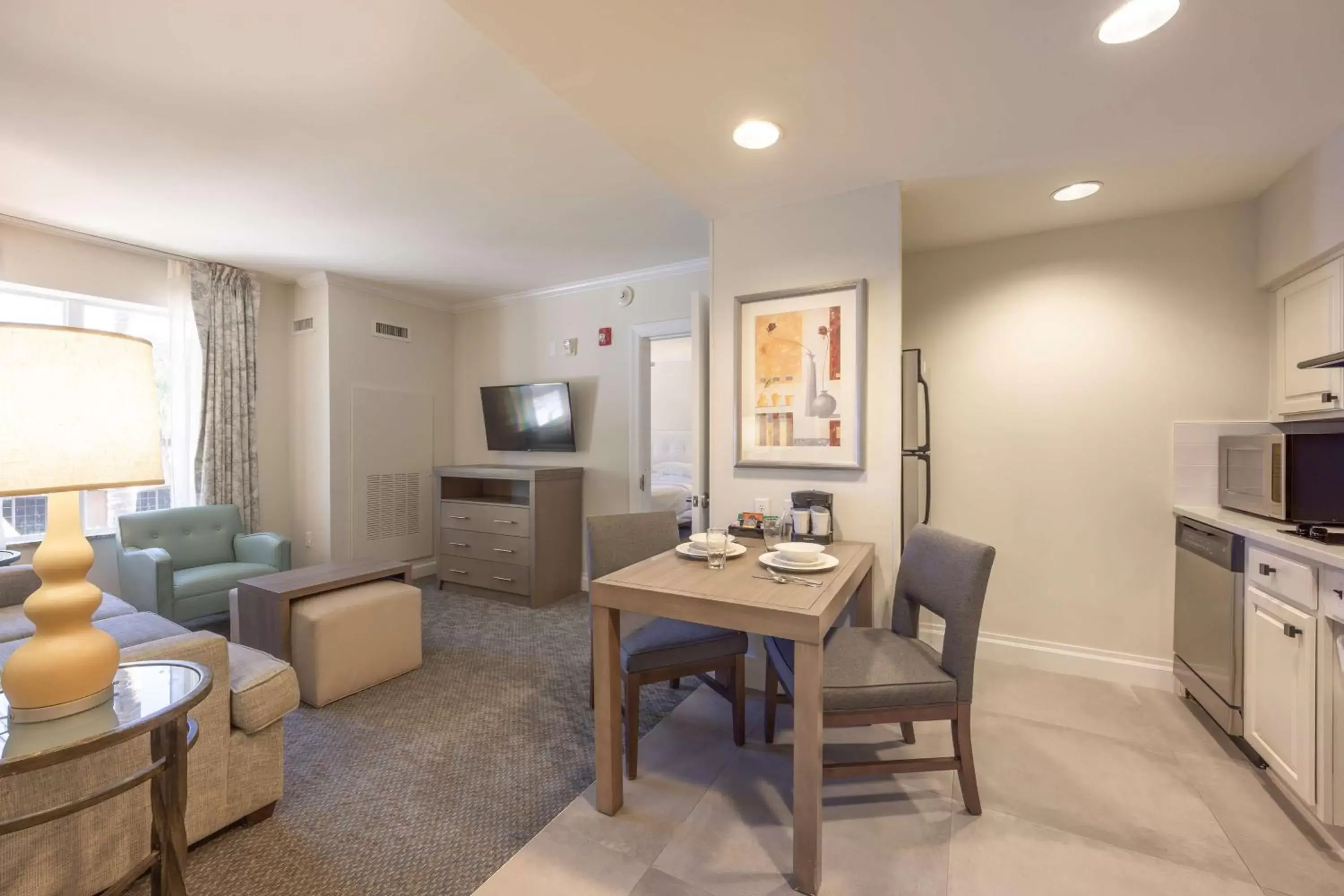 Living room, Dining Area in Homewood Suites by Hilton Palm Beach Gardens