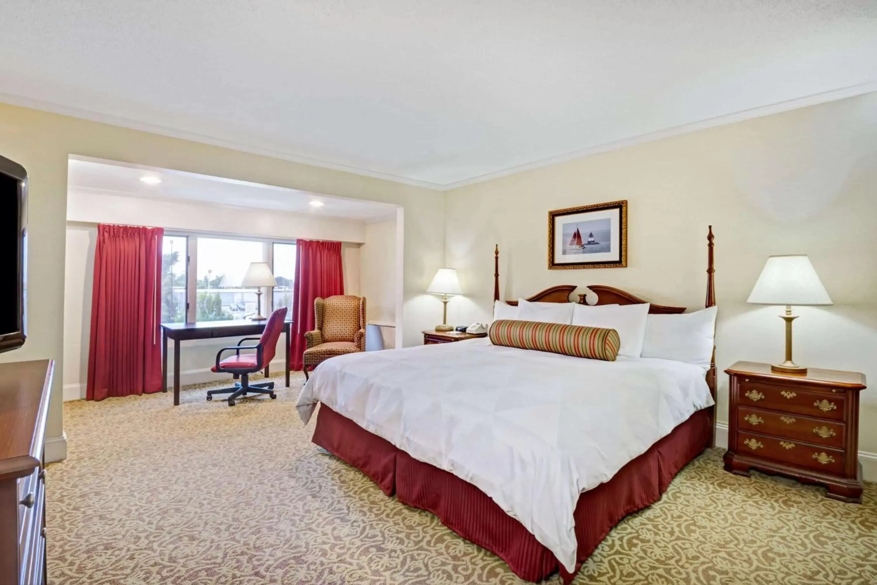 Photo of the whole room, Bed in Ramada by Wyndham Seekonk Providence Area