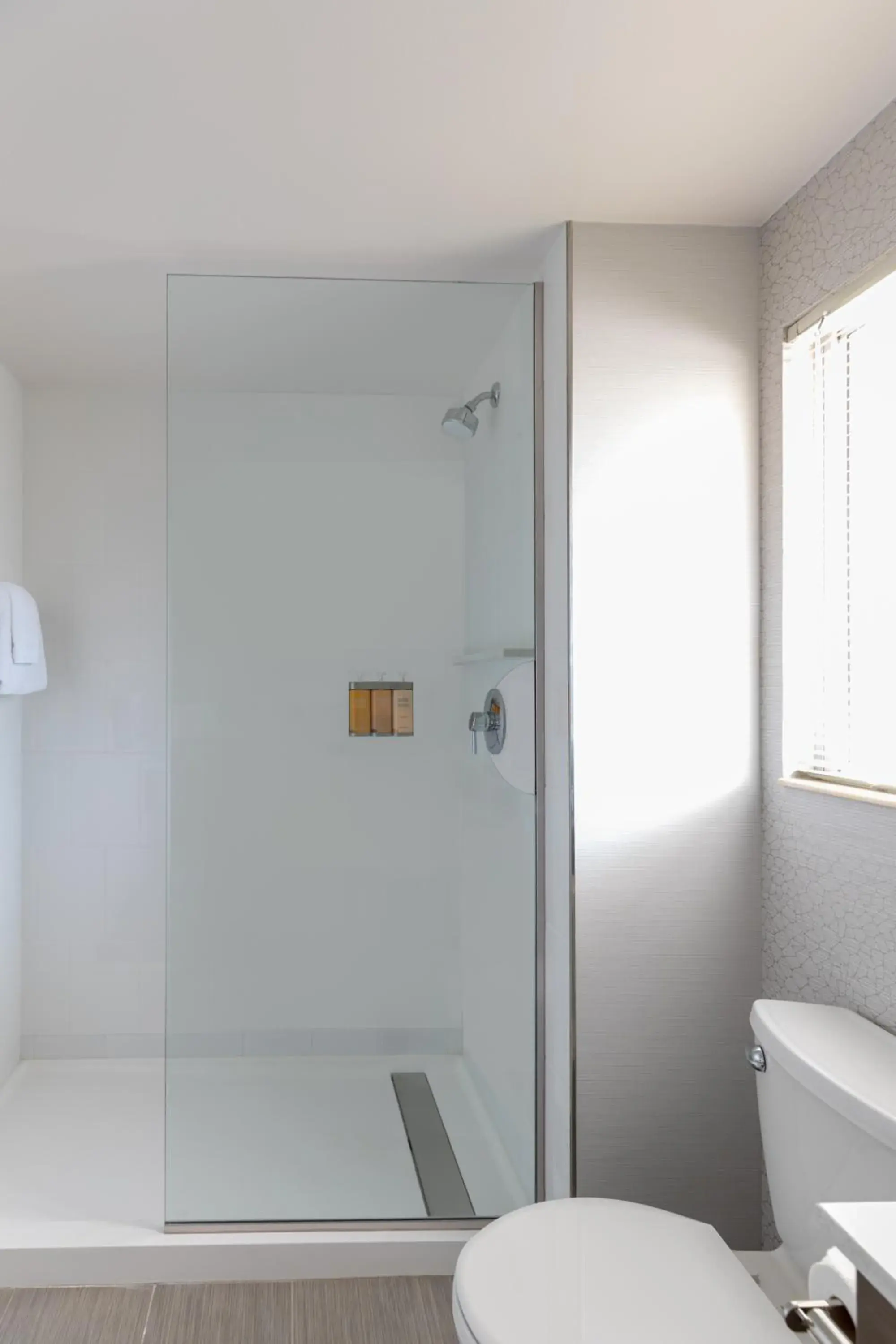 Bathroom in West Beach Inn, a Coast Hotel