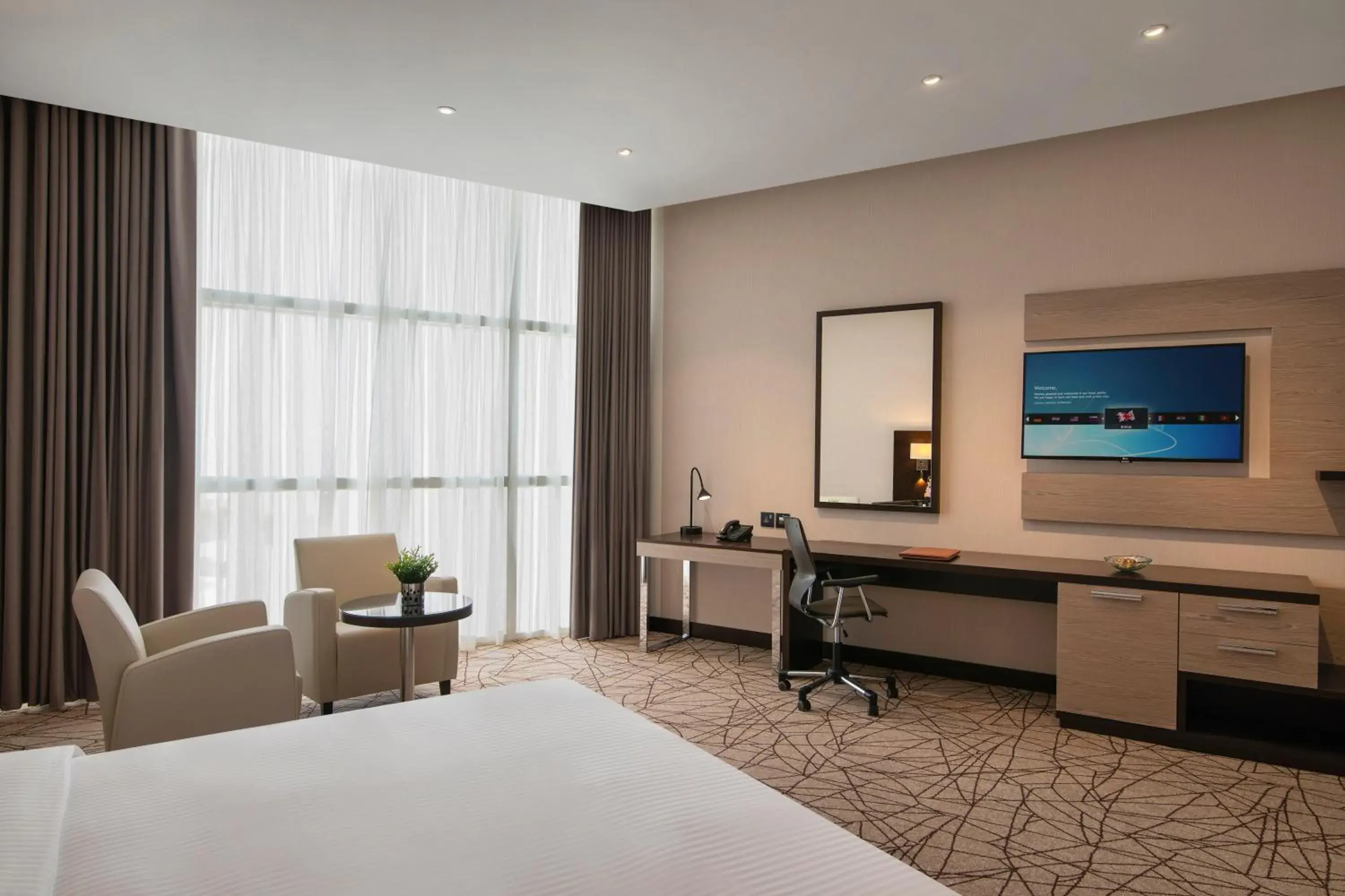 Bedroom, TV/Entertainment Center in Cristal Amaken Hotel Riyadh
