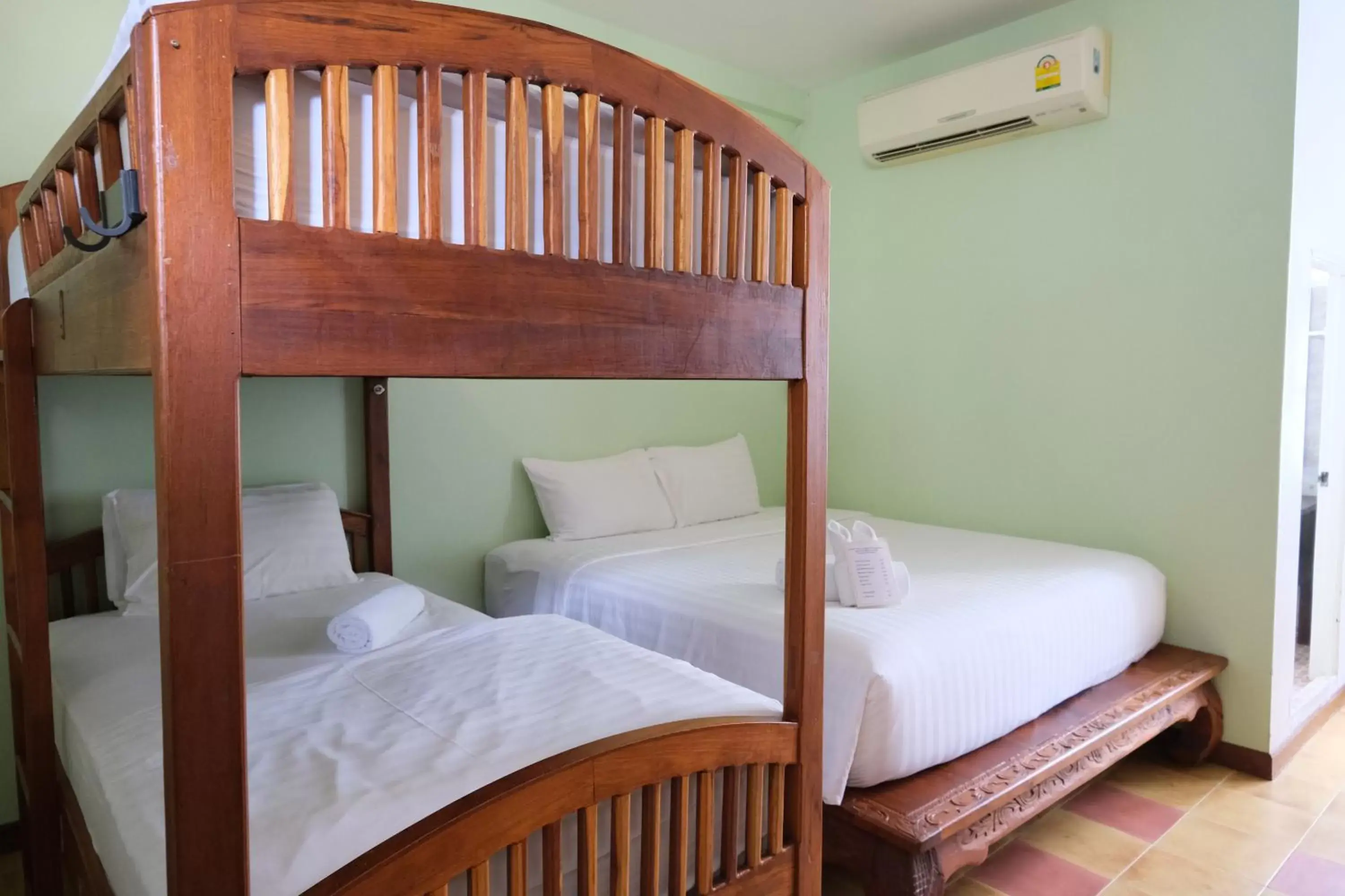 Bed, Bunk Bed in Feung Nakorn Balcony Rooms and Cafe
