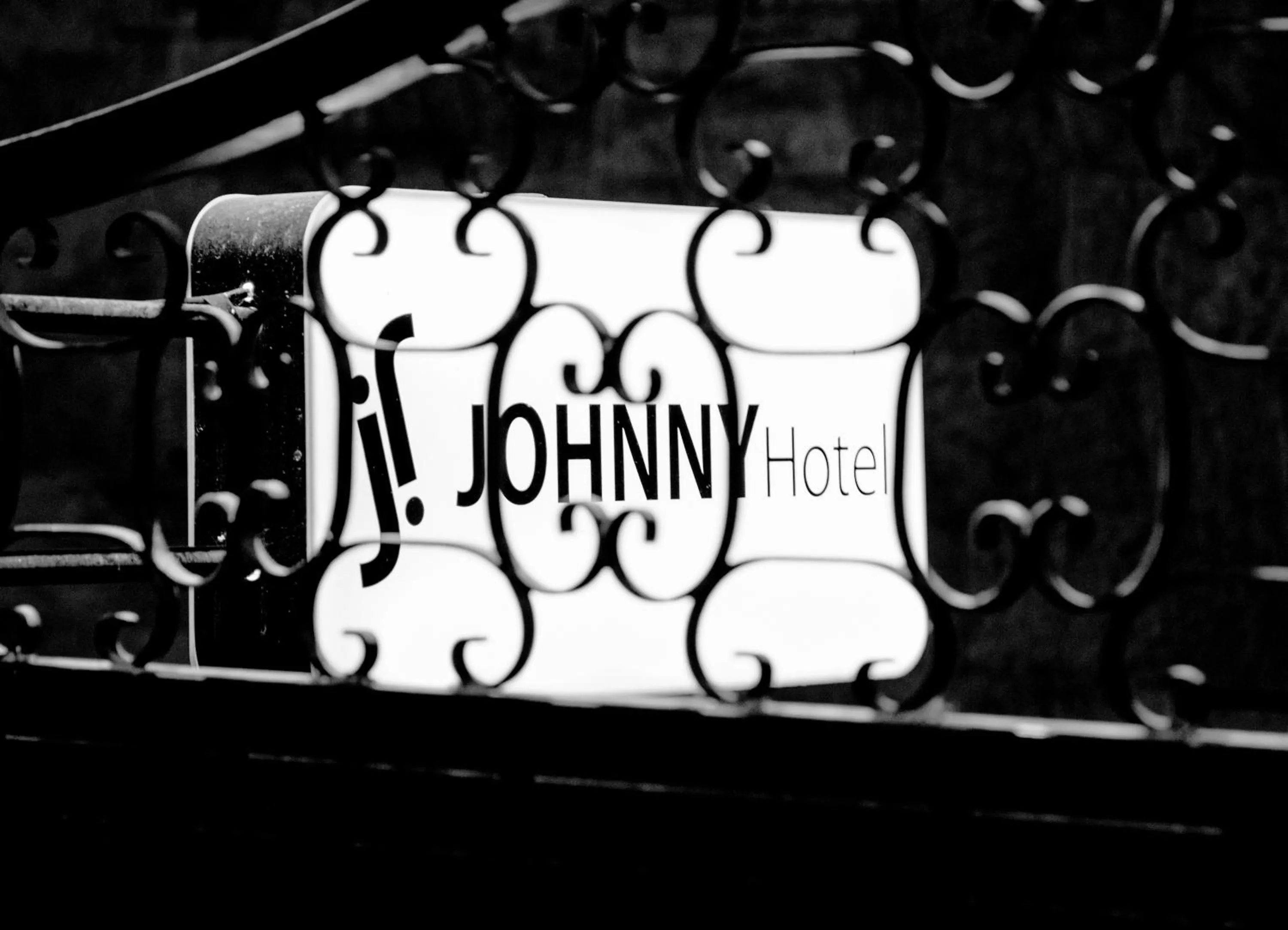 Property logo or sign in Johnny Hotel