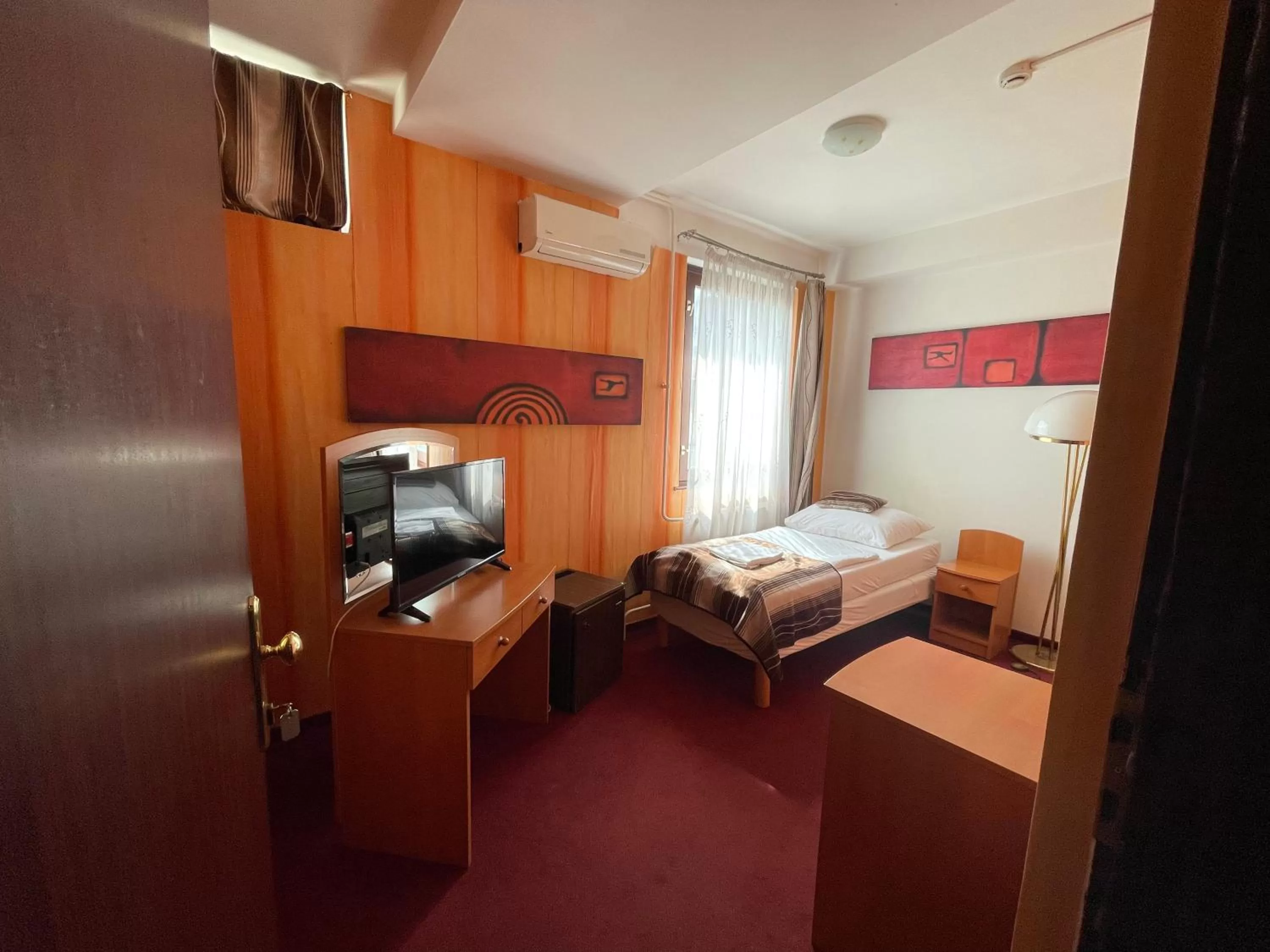 Bed in Hotel Minaret&Étterem