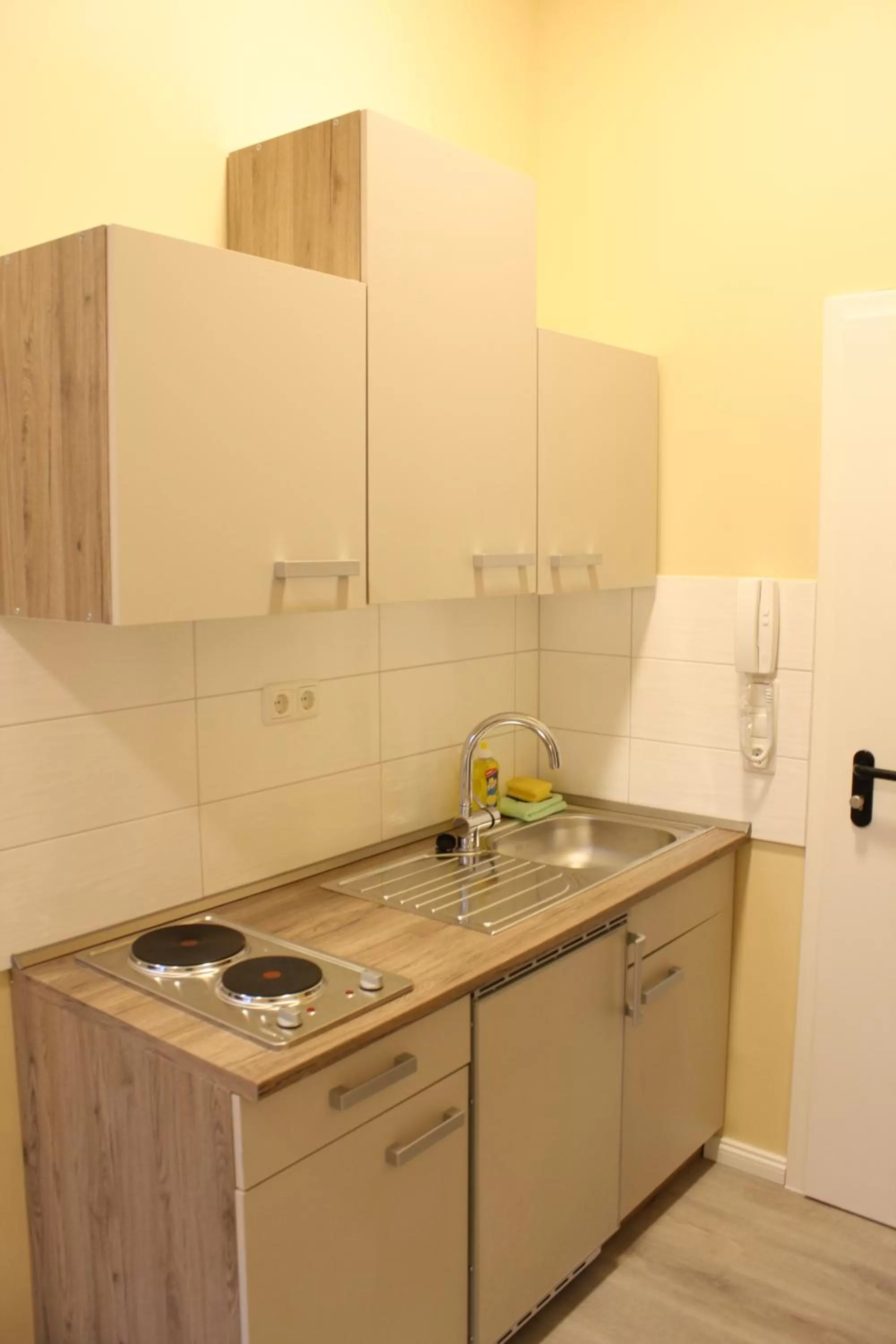 Kitchen or kitchenette in M&M Hotel - Harburg