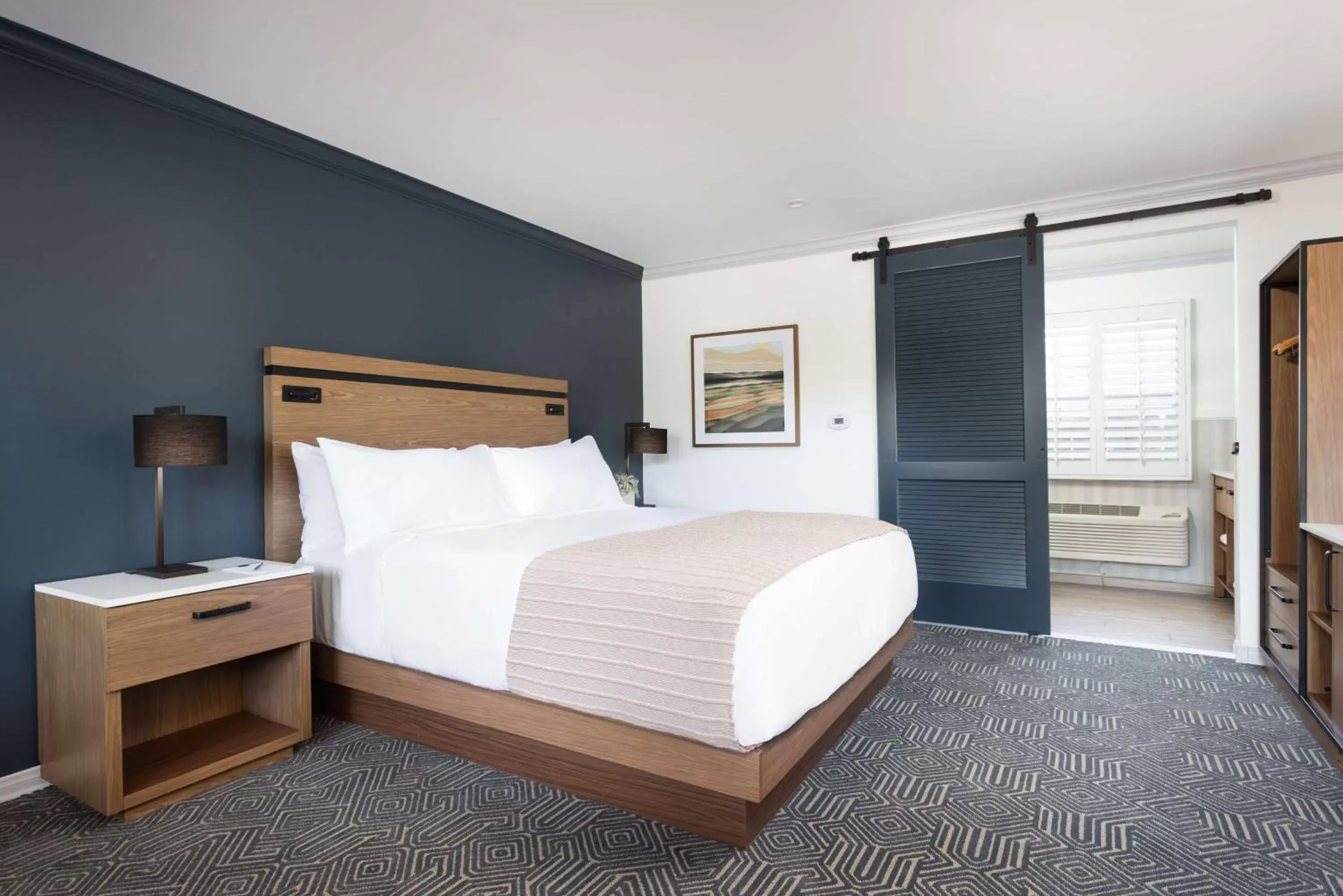 Bed in The Hadsten Solvang, Tapestry Collection by Hilton Bed in The Hadsten Solvang, Tapestry Collection by Hilton