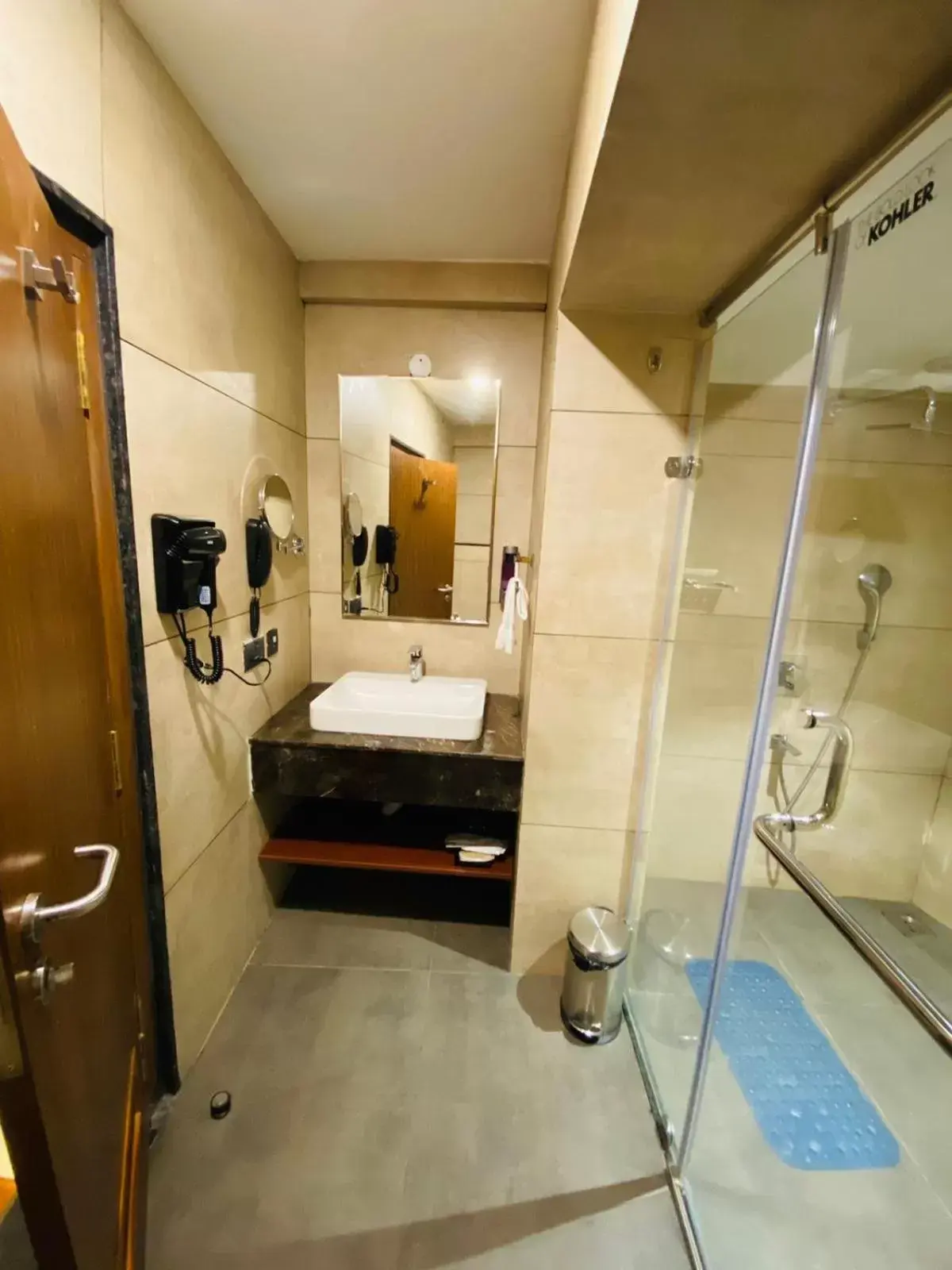 Bathroom, Bed in Royal Plaza Suites by RAK Rooms, Mangaluru Bathroom, Bed in Royal Plaza Suites by RAK Rooms, Mangaluru