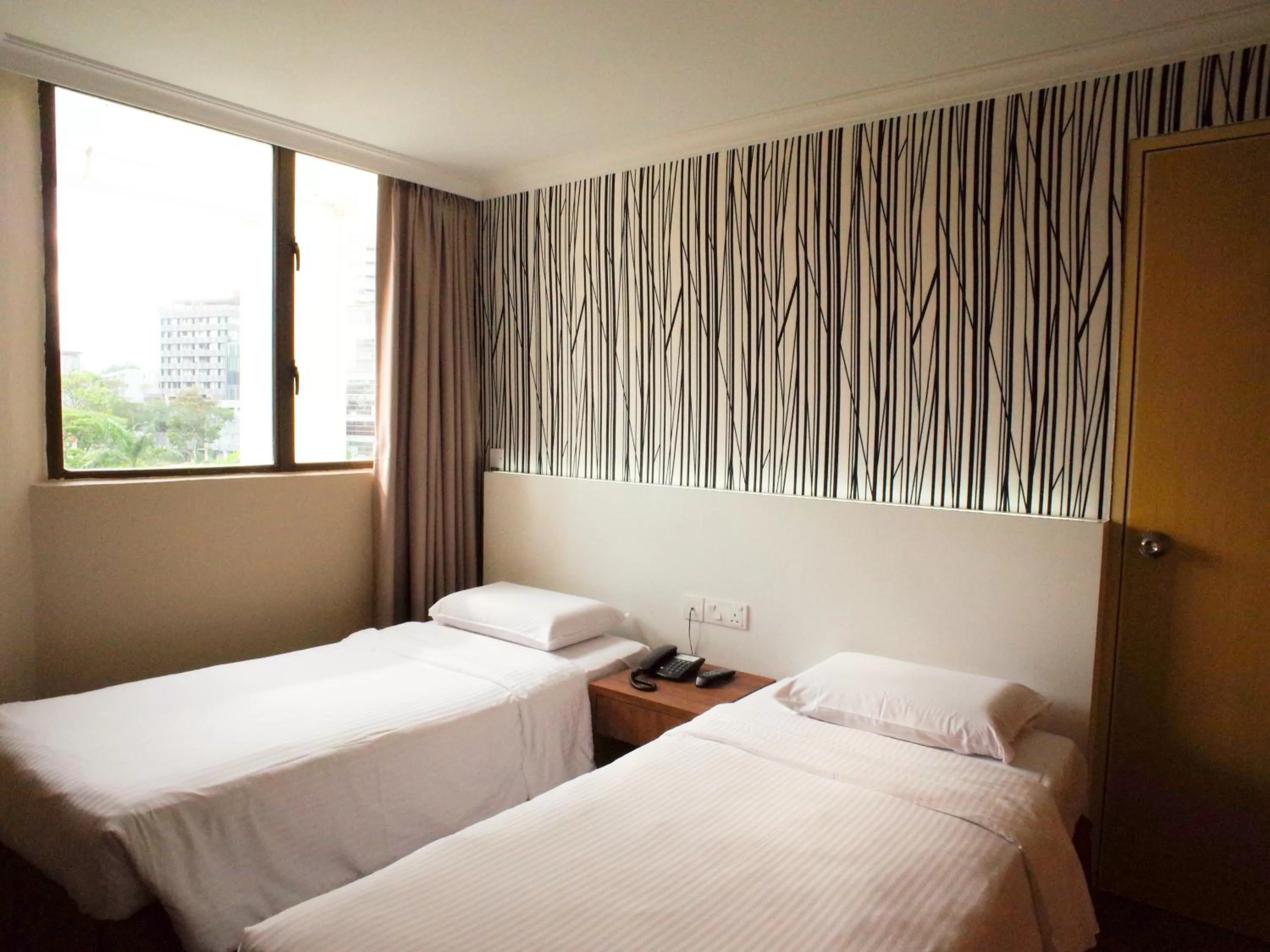 Bed in YMCA One Orchard