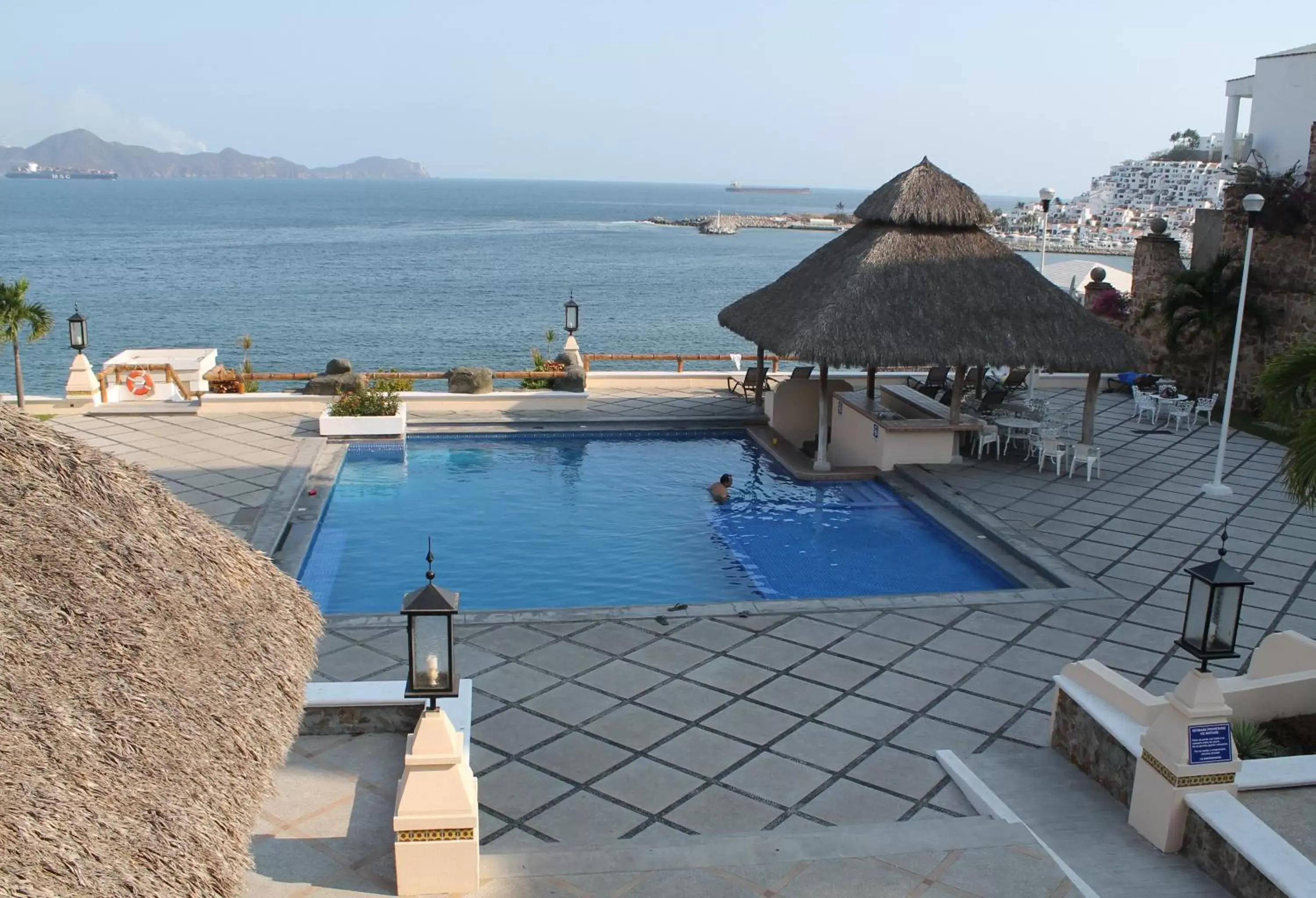 Day, Swimming Pool in Villas del Palmar Manzanillo with Beach Club