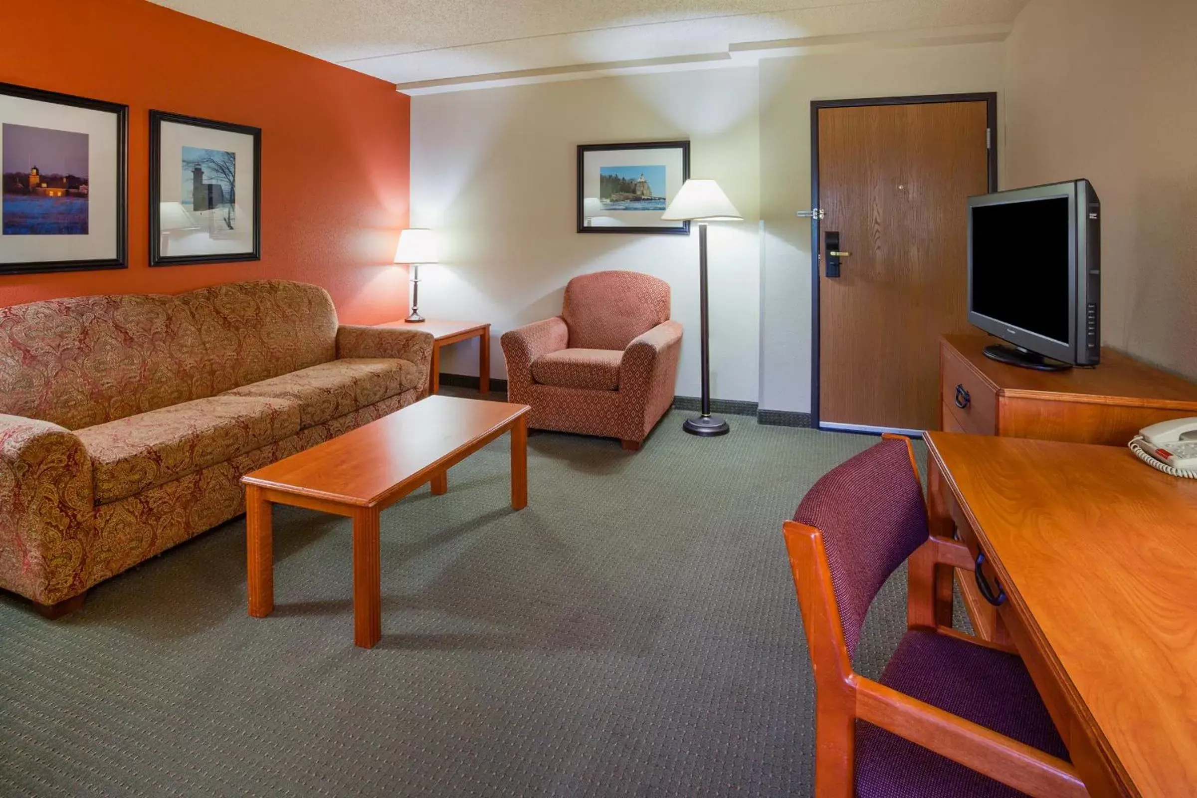 Photo of the whole room, Seating Area in AmericInn by Wyndham Wetmore Munising