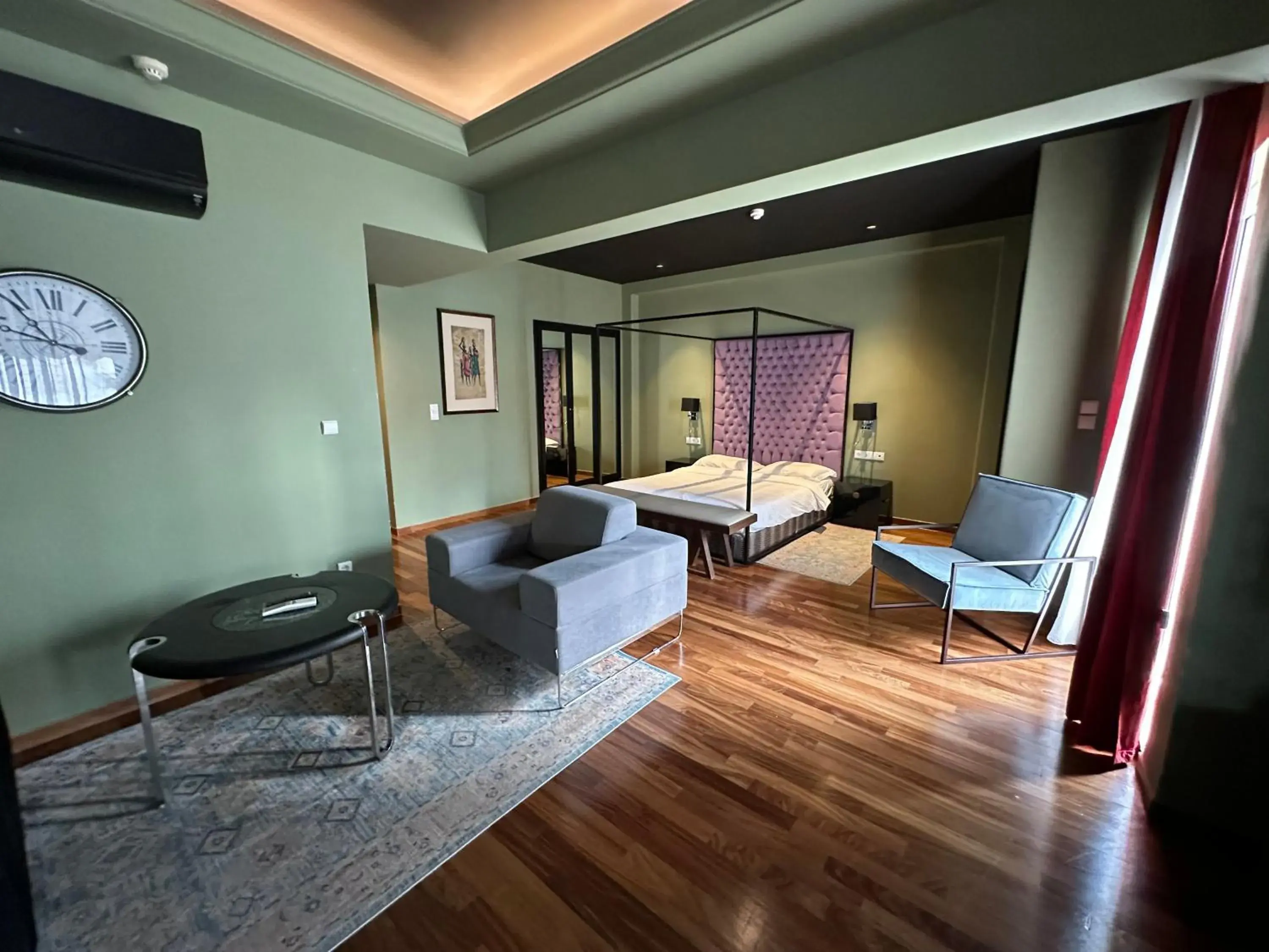 Bed, Seating Area in Andromeda Suites & Apartments