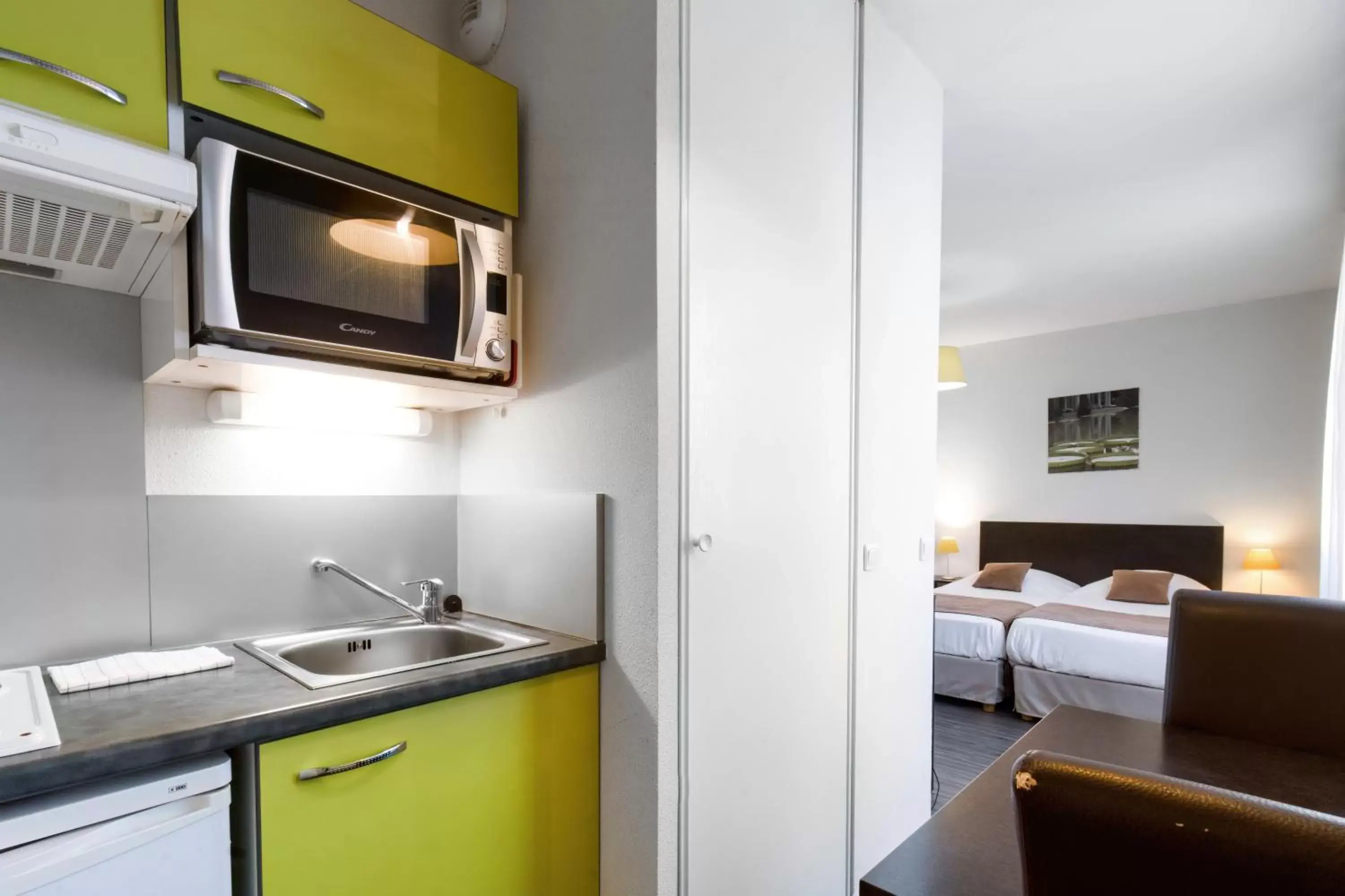 Kitchen/Kitchenette in All Suites Pau – Zénith