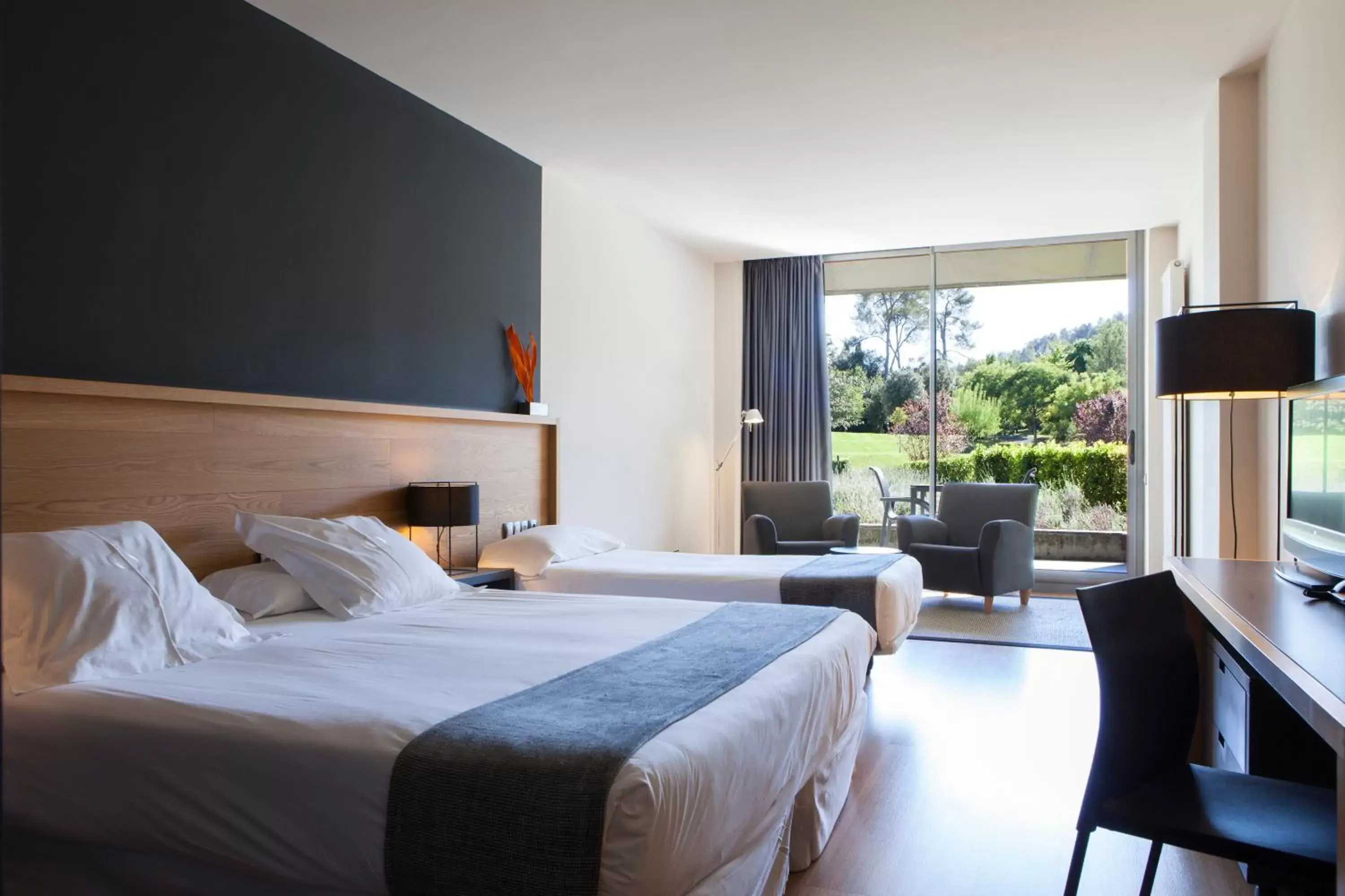 Bed in Hotel Món Sant Benet Bed in Hotel Món Sant Benet