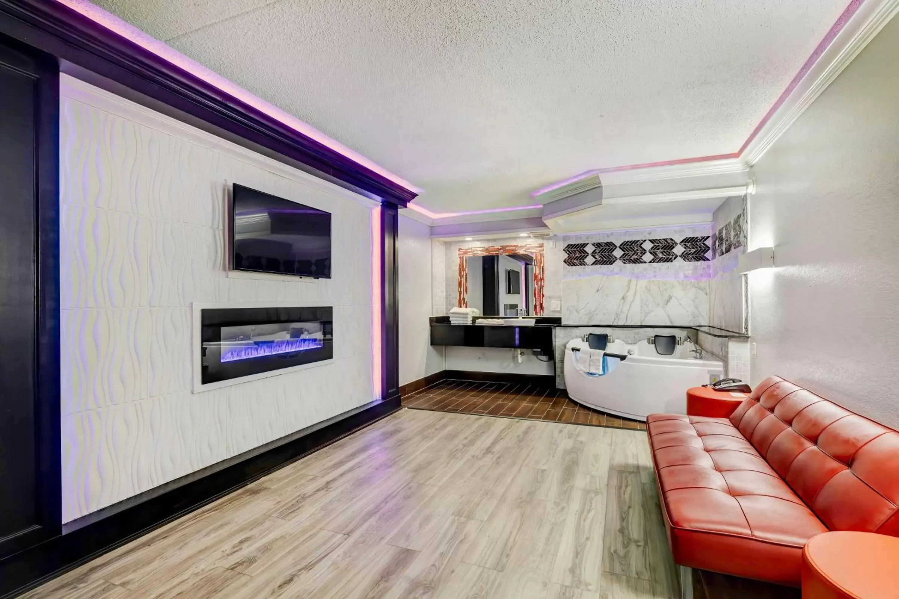 Photo of the whole room, Seating Area in Motel 6 North Little Rock, AR-JFK Blvd