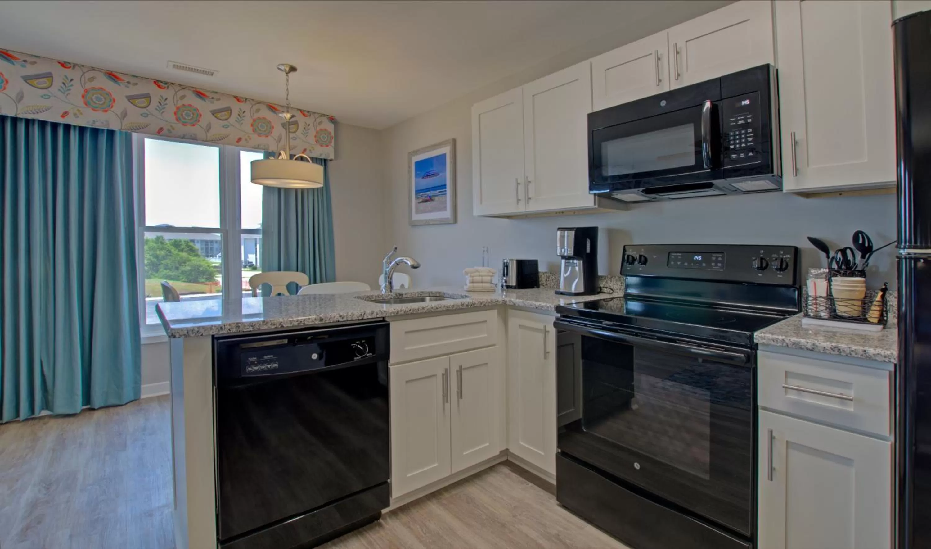 Kitchen or kitchenette in Atlantic Beach Resort, a Ramada by Wyndham