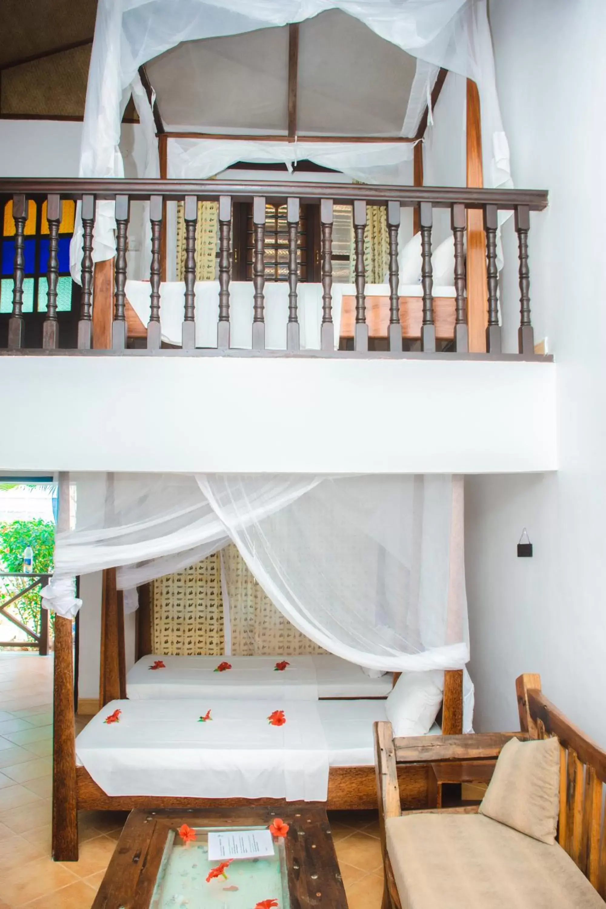 Bed in Mnarani Beach Cottages