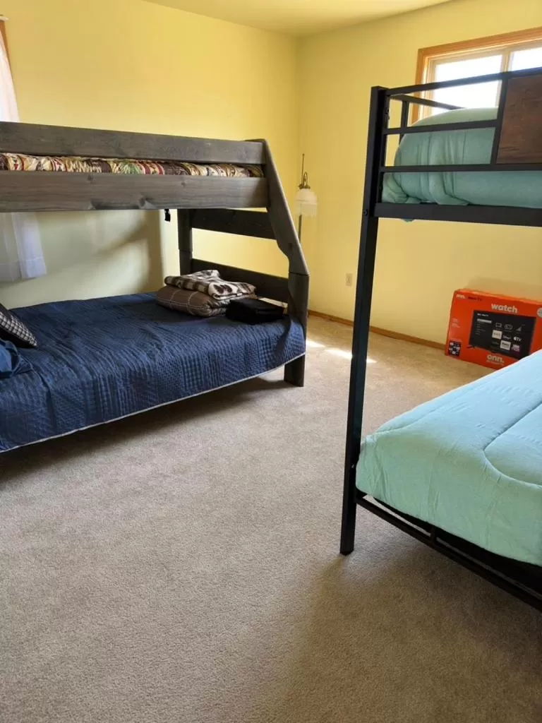 Bed in Sportsman Lodge Melrose MT