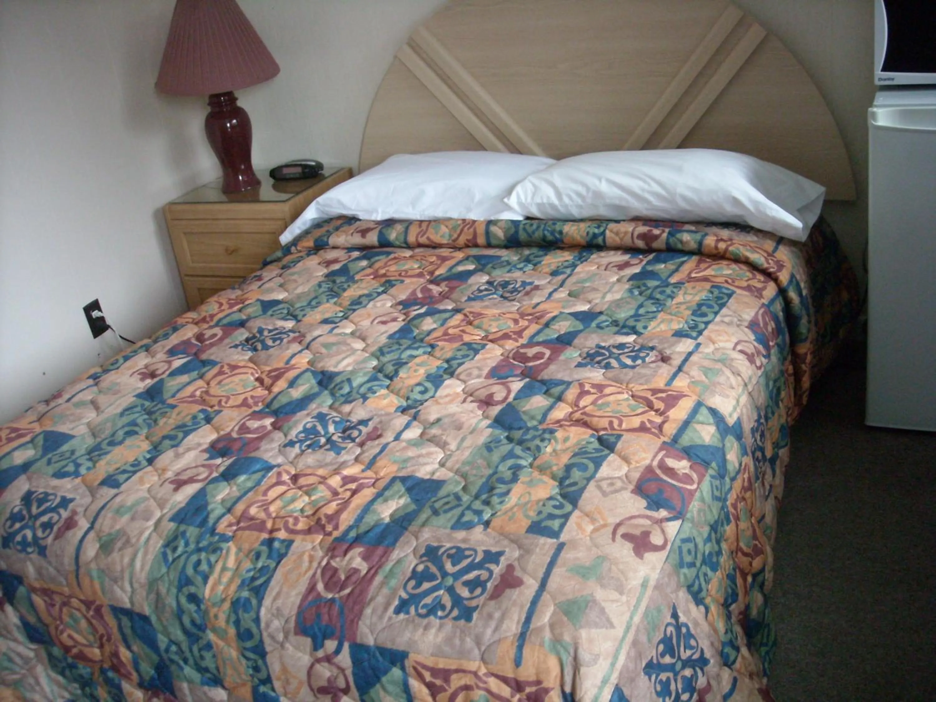 Bed in Motel le Verseau