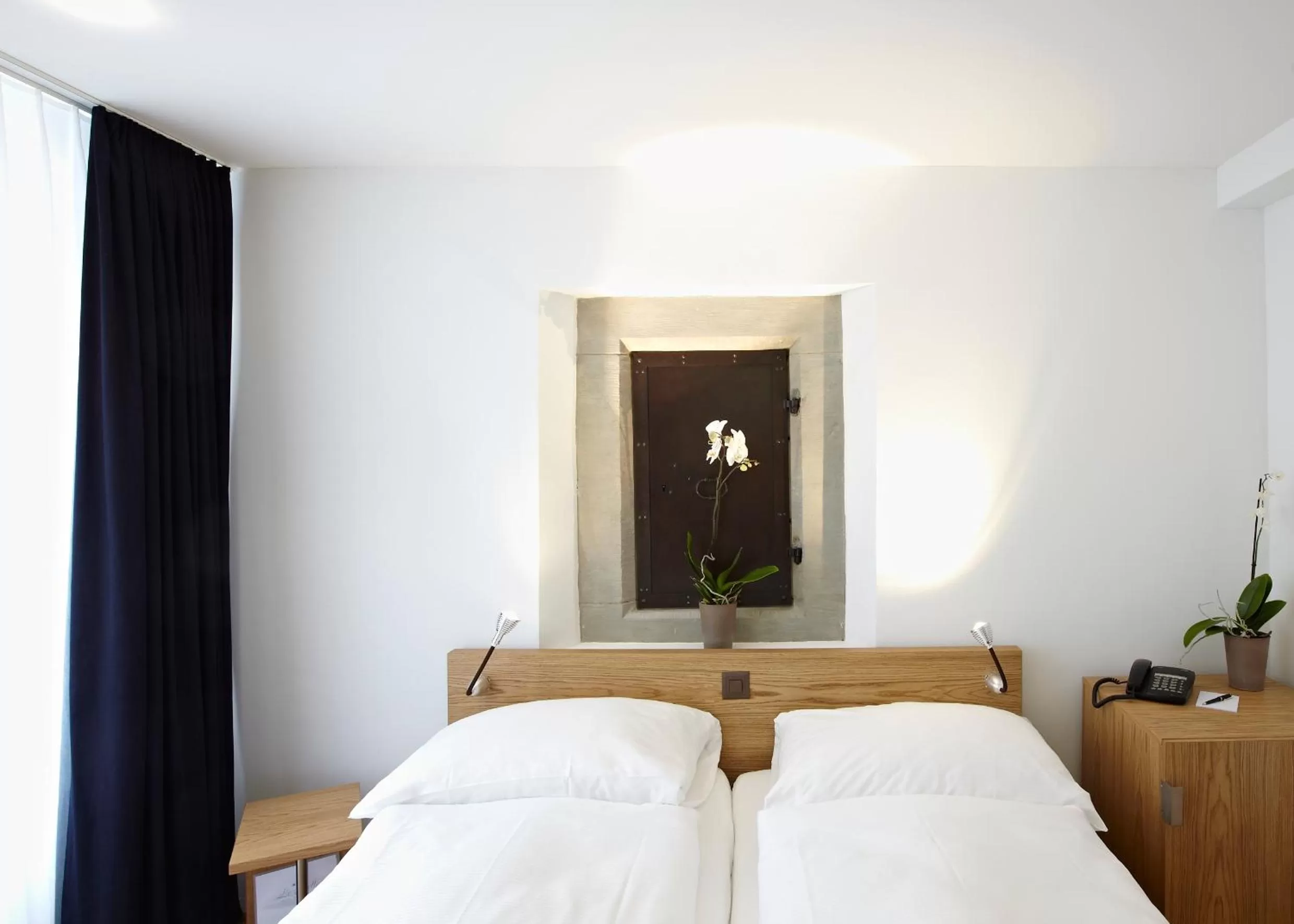 Bed in Hotel Lestelle - self check-in