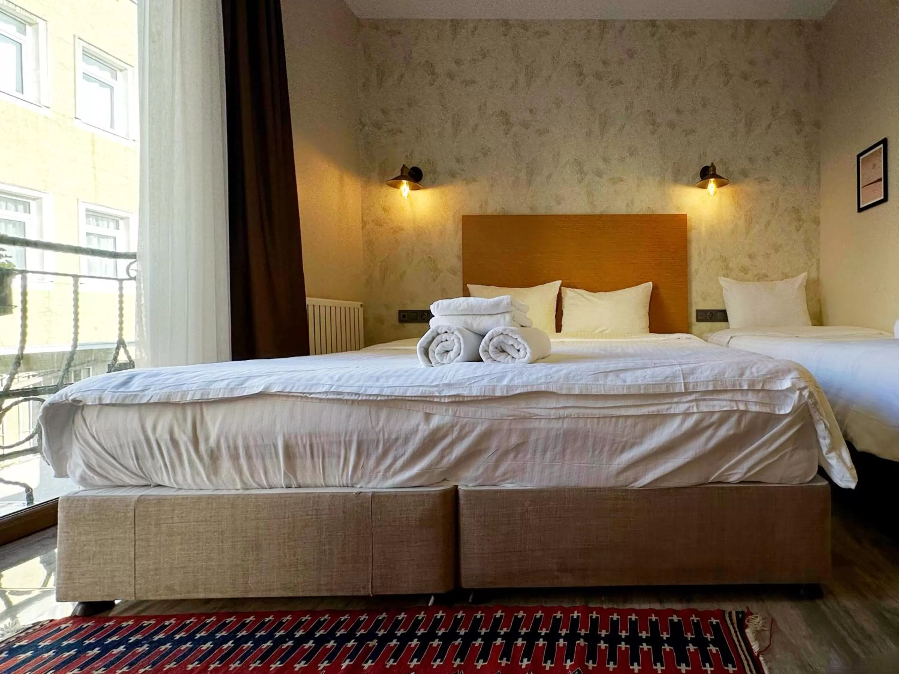 Bed in Sultan Pier Hotel