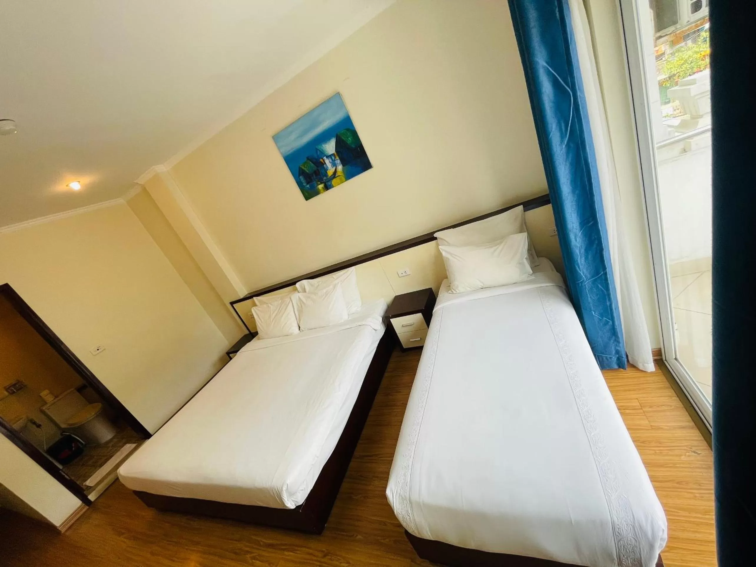 Property building, Bed in Rising Dragon Hotel