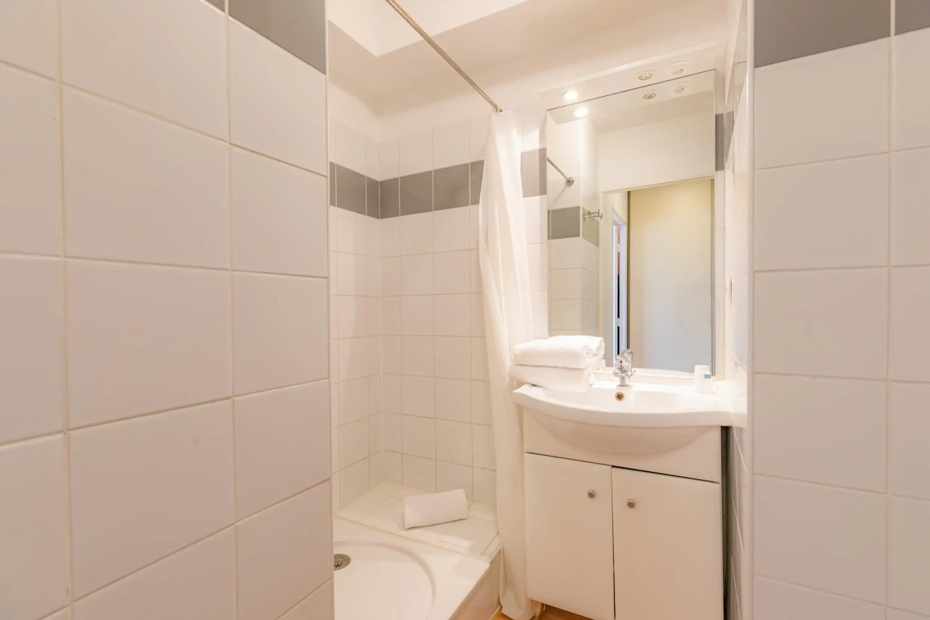 Shower, Bathroom in Appart'City Bourg en Bresse (Ex Park&Suites)