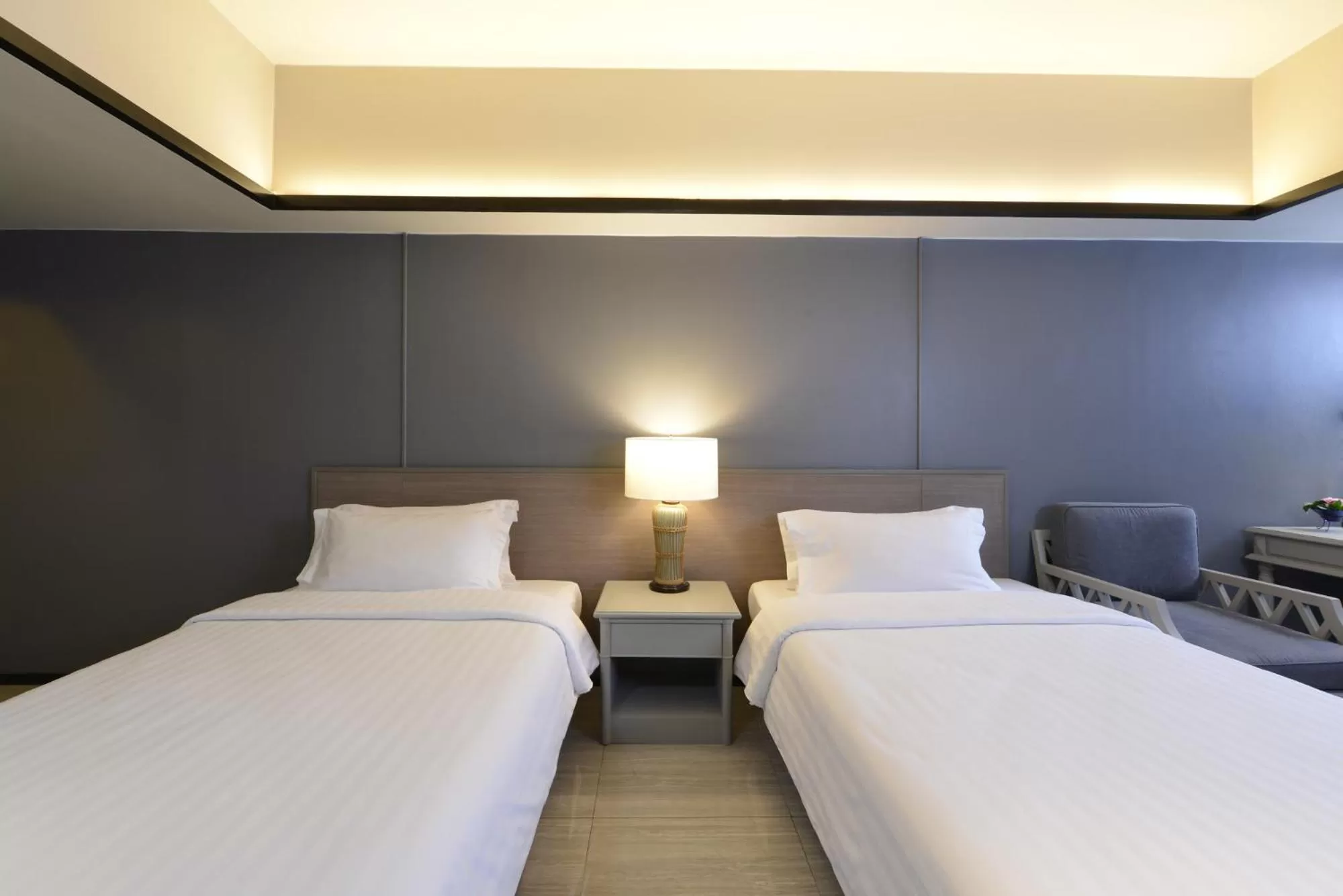 Bed in Tinidee Hotel Bangkok Golf Club