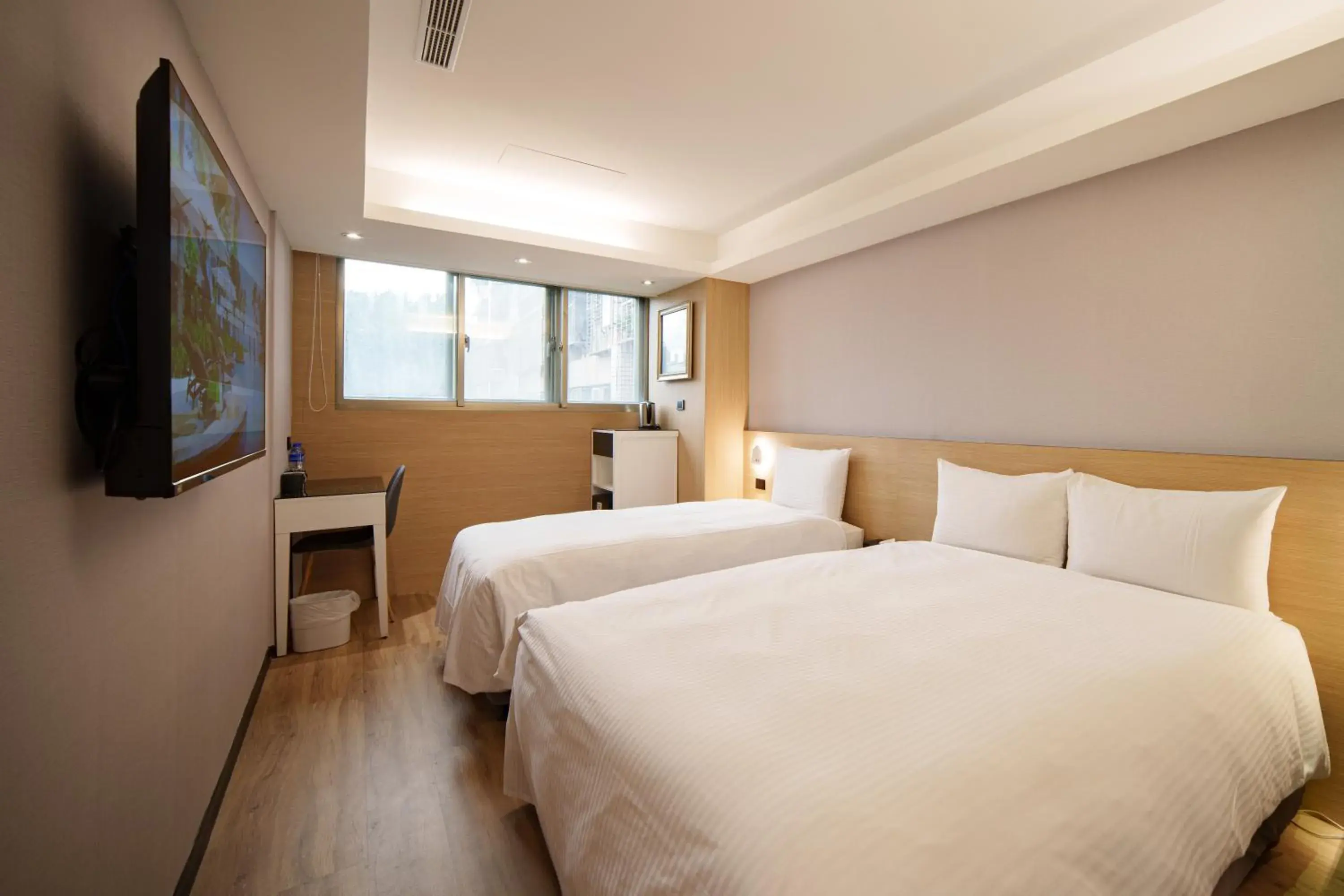 Bed in Hub Hotel Tucheng