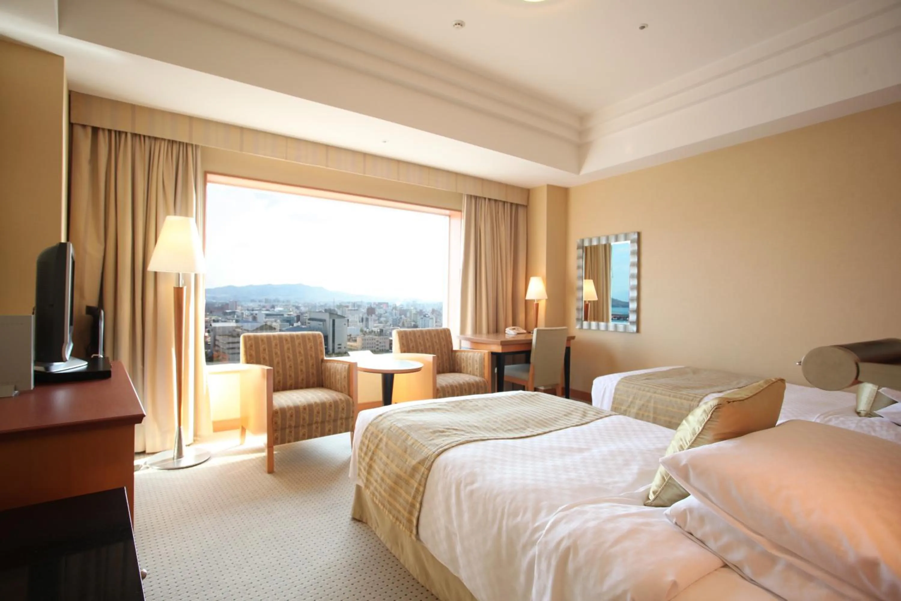 Photo of the whole room, Bed in JR Hotel Clement Takamatsu