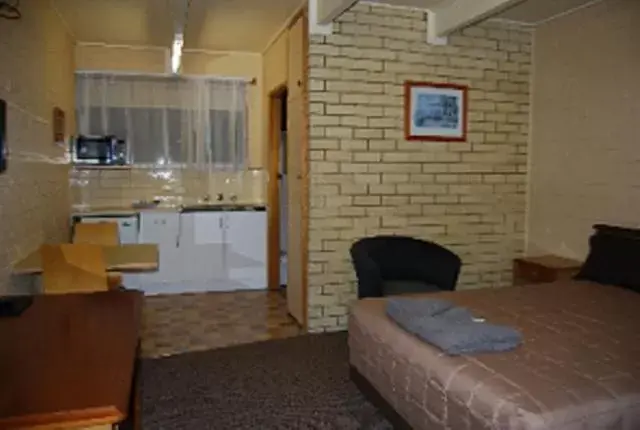 Photo of the whole room, Kitchen/Kitchenette in Coastal Comfort Motel