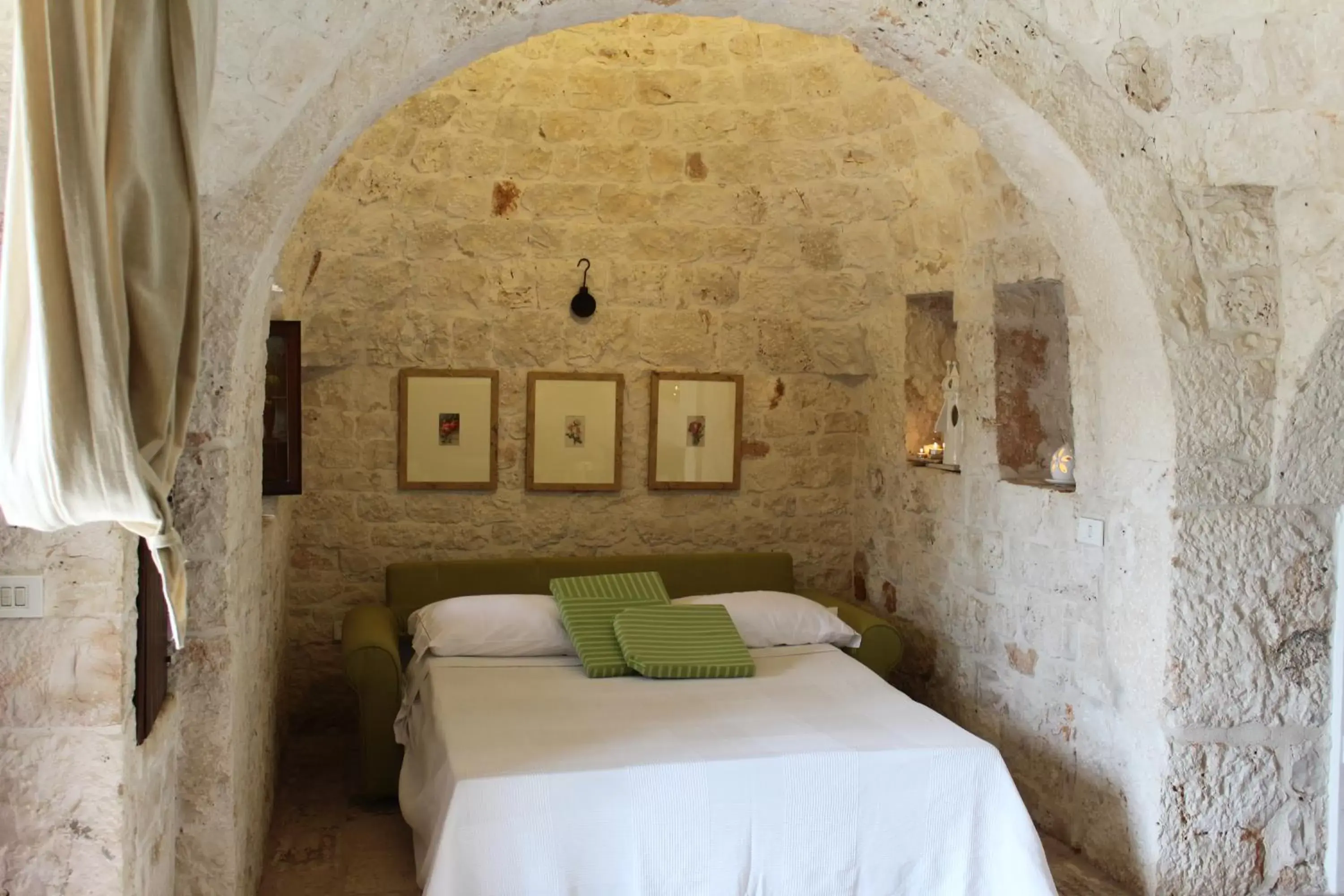 Photo of the whole room, Bed in Trulli Terra Magica