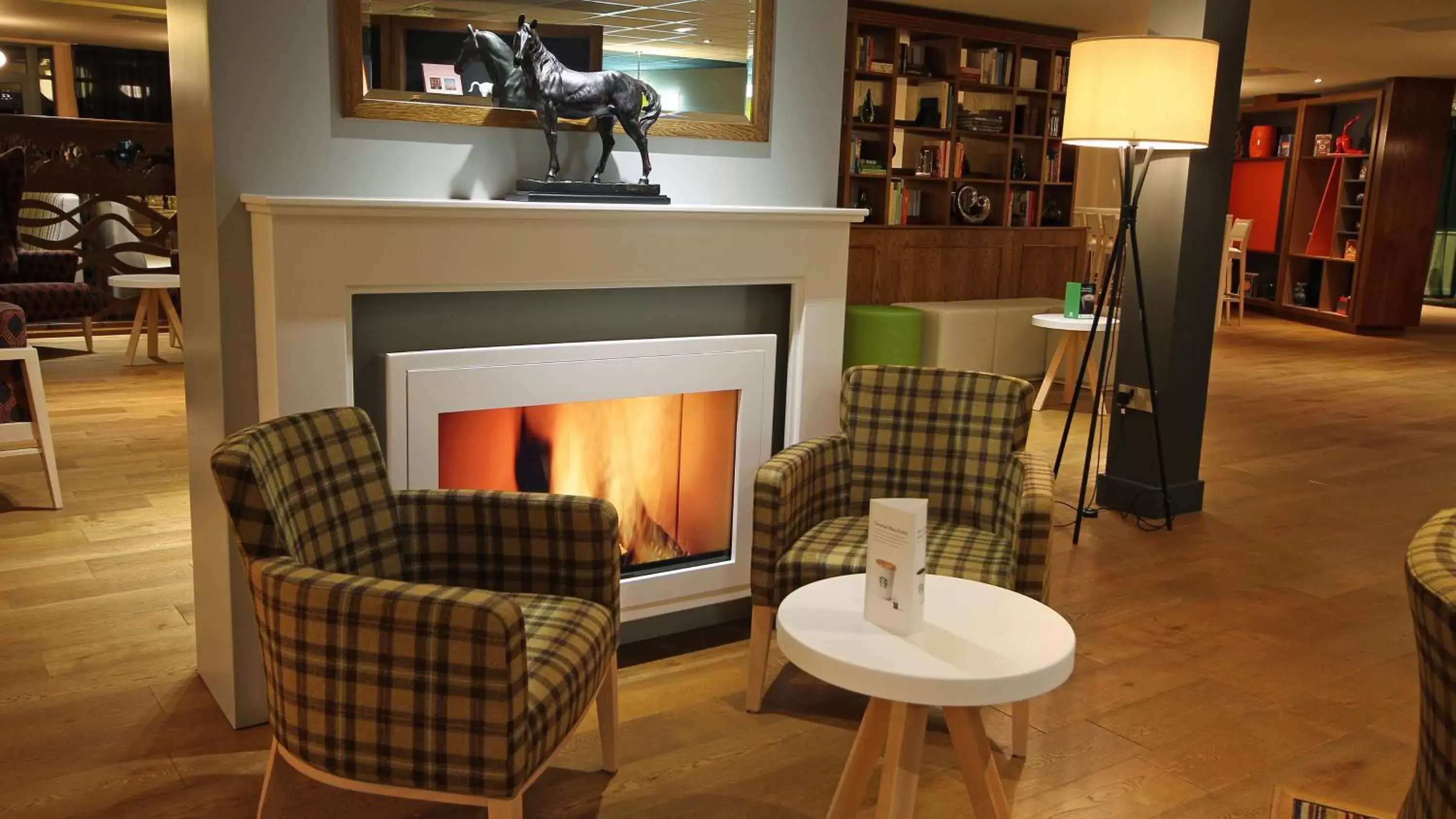 Property building, Seating Area in Holiday Inn Huntingdon Racecourse, an IHG Hotel