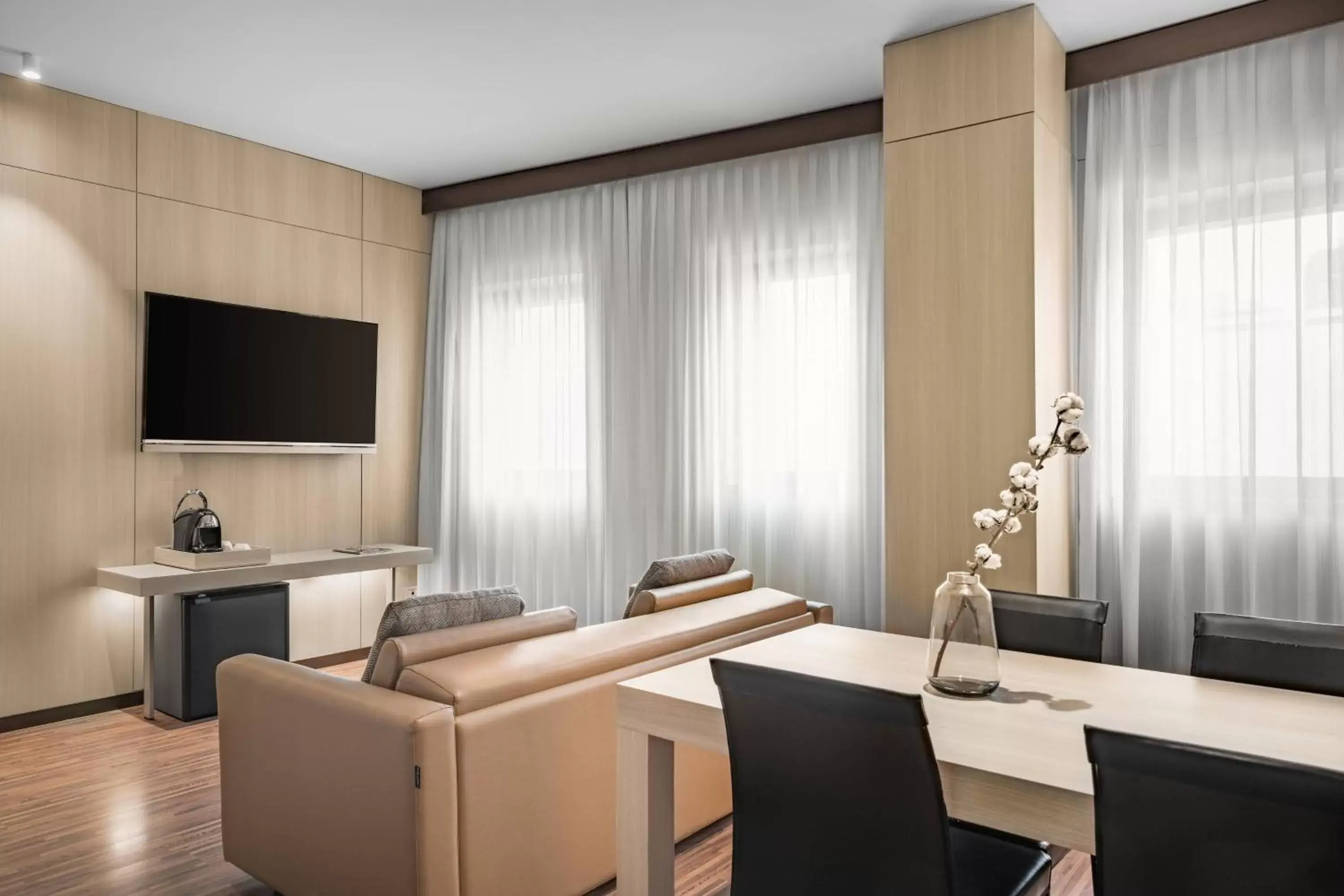 Photo of the whole room, TV/Entertainment Center in AC Hotel Milano by Marriott