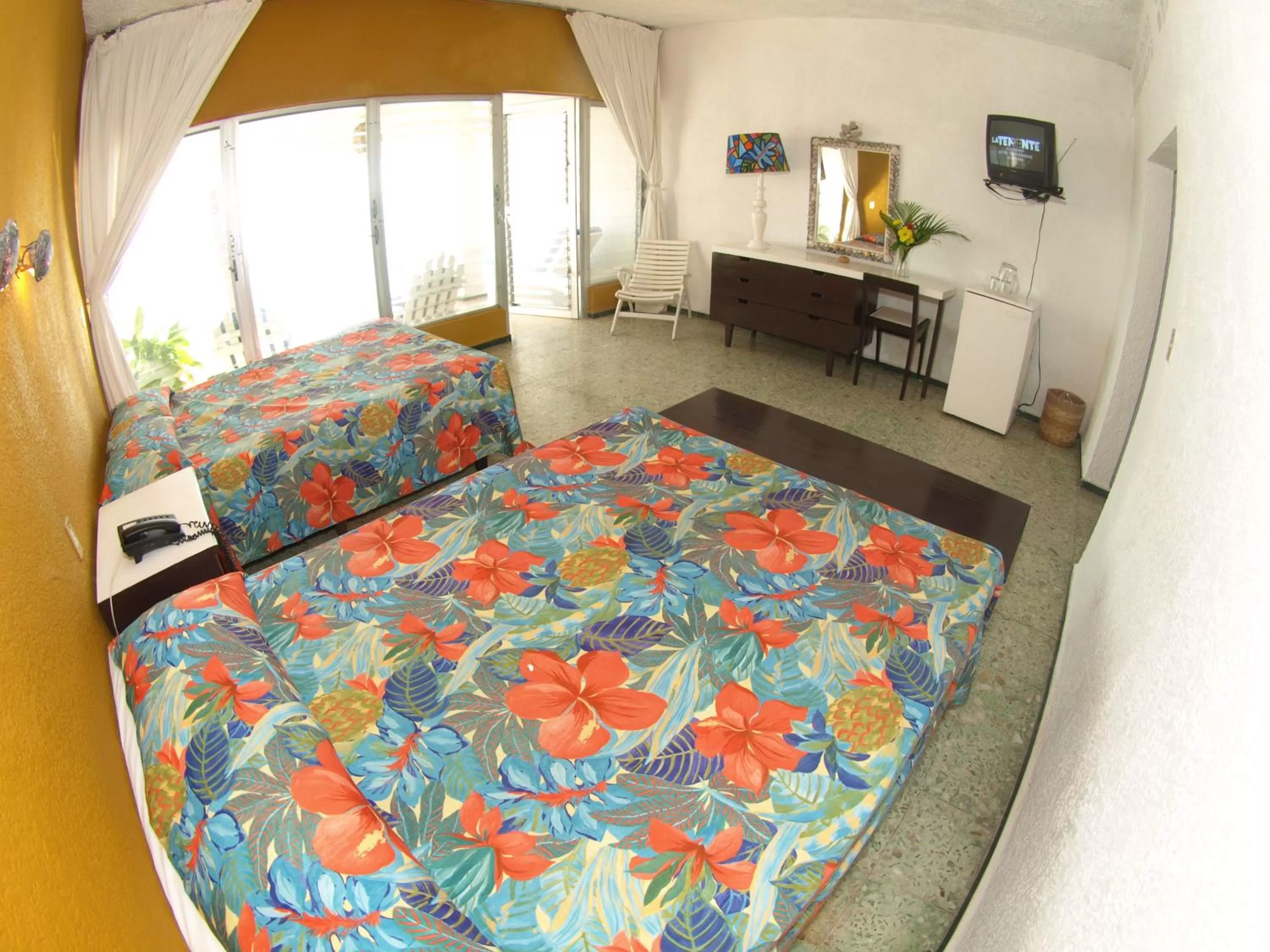 Bed in Hotel Flamingos