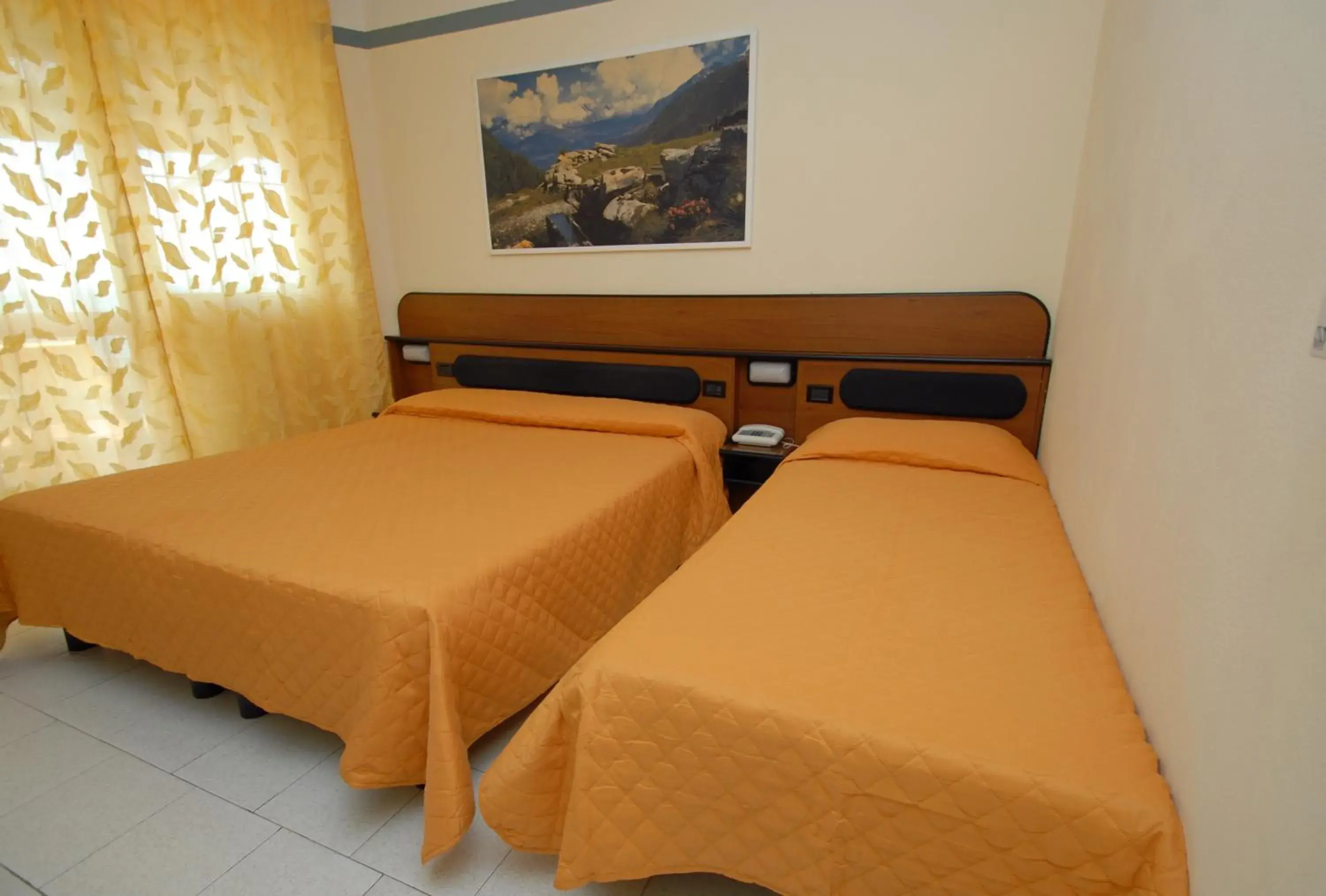 Bed in Hotel Baia Del Sorriso